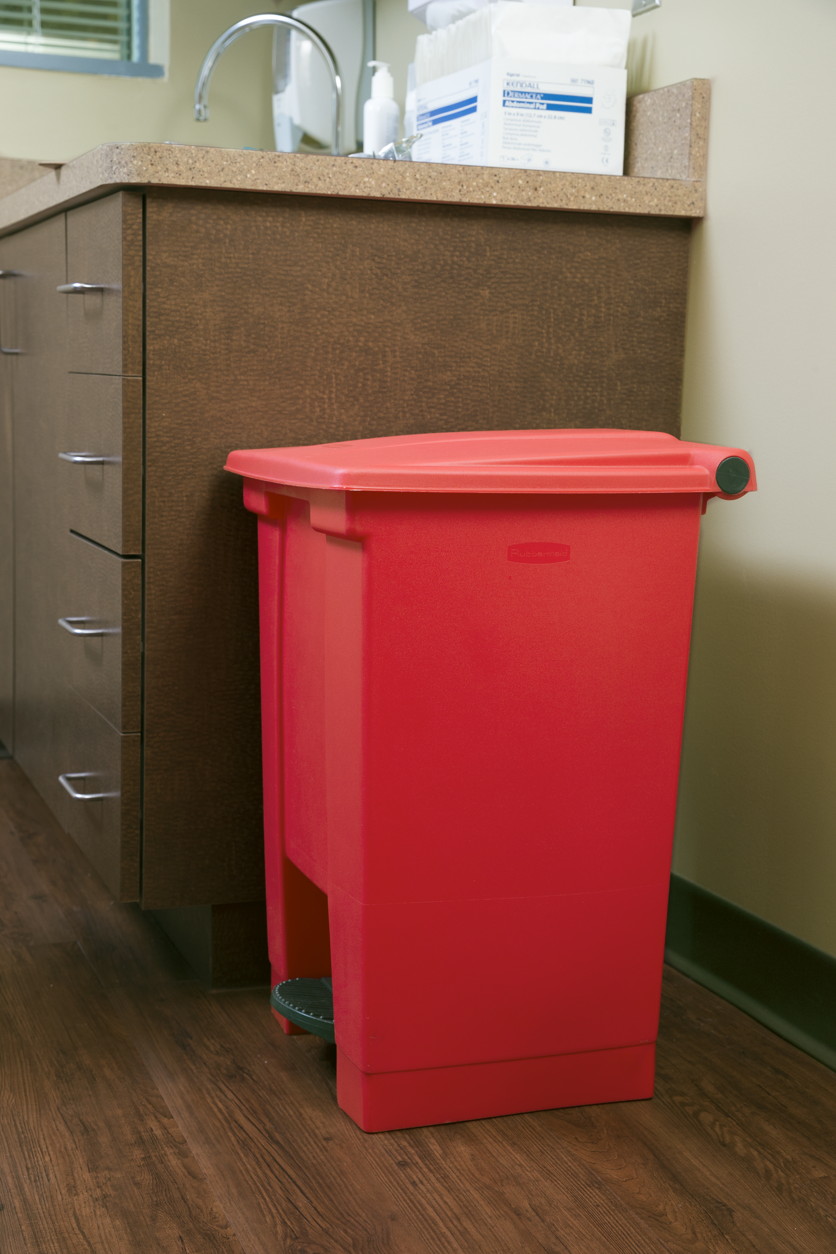 The Rubbermaid Commercial Step-On Container provides sanitary waste management.
