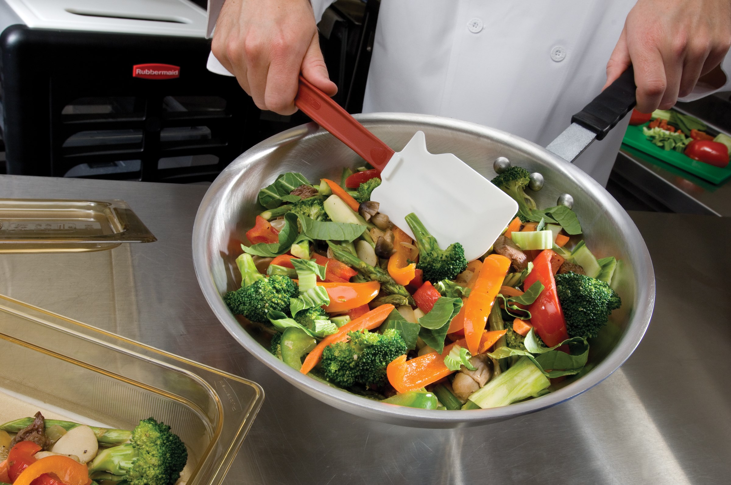 Rubbermaid Commercial high-heat scraper is for use in the kitchen. Blade is stain resistant and will not scratch cookware.