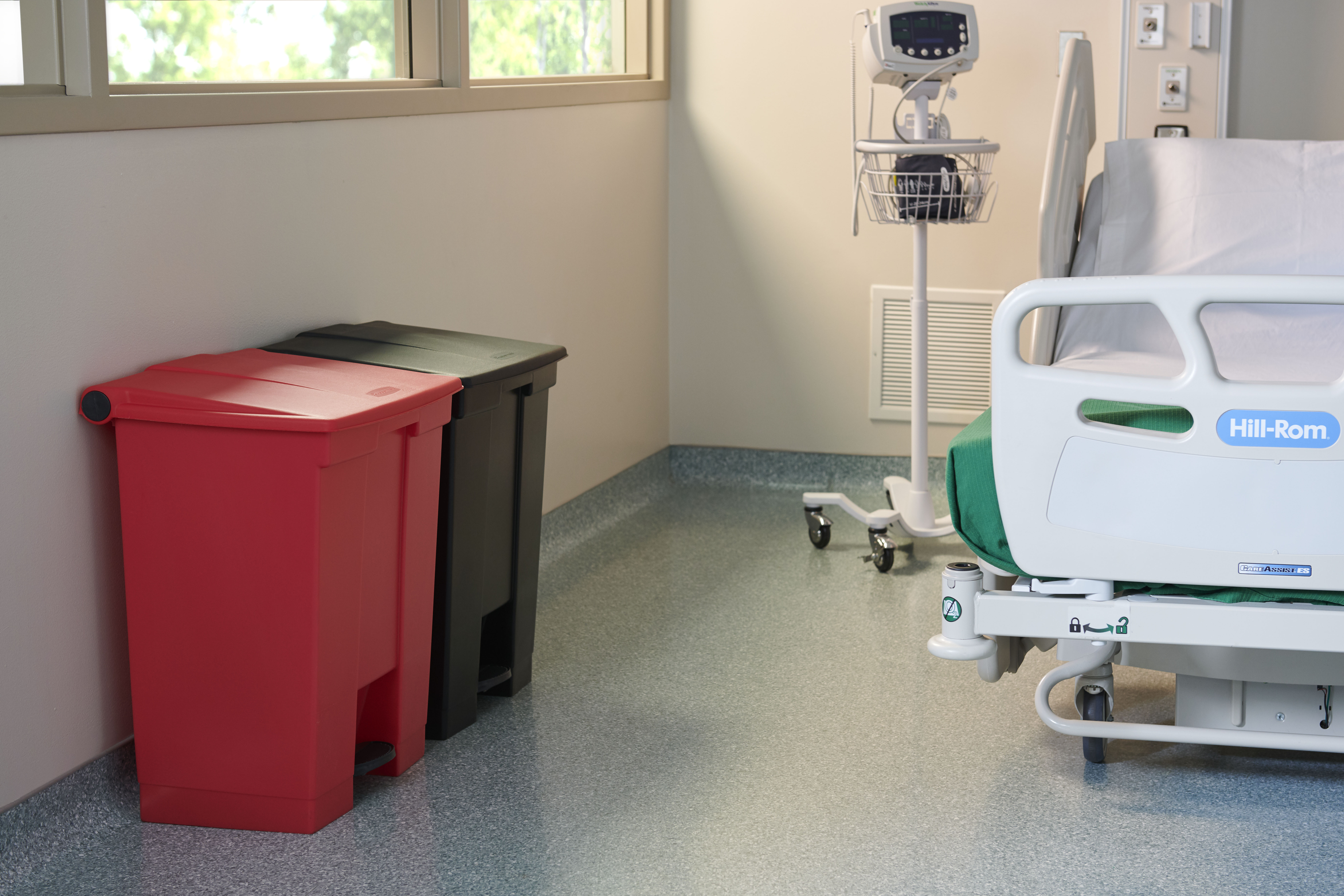 The Rubbermaid Commercial Step-On Container provides sanitary waste management.