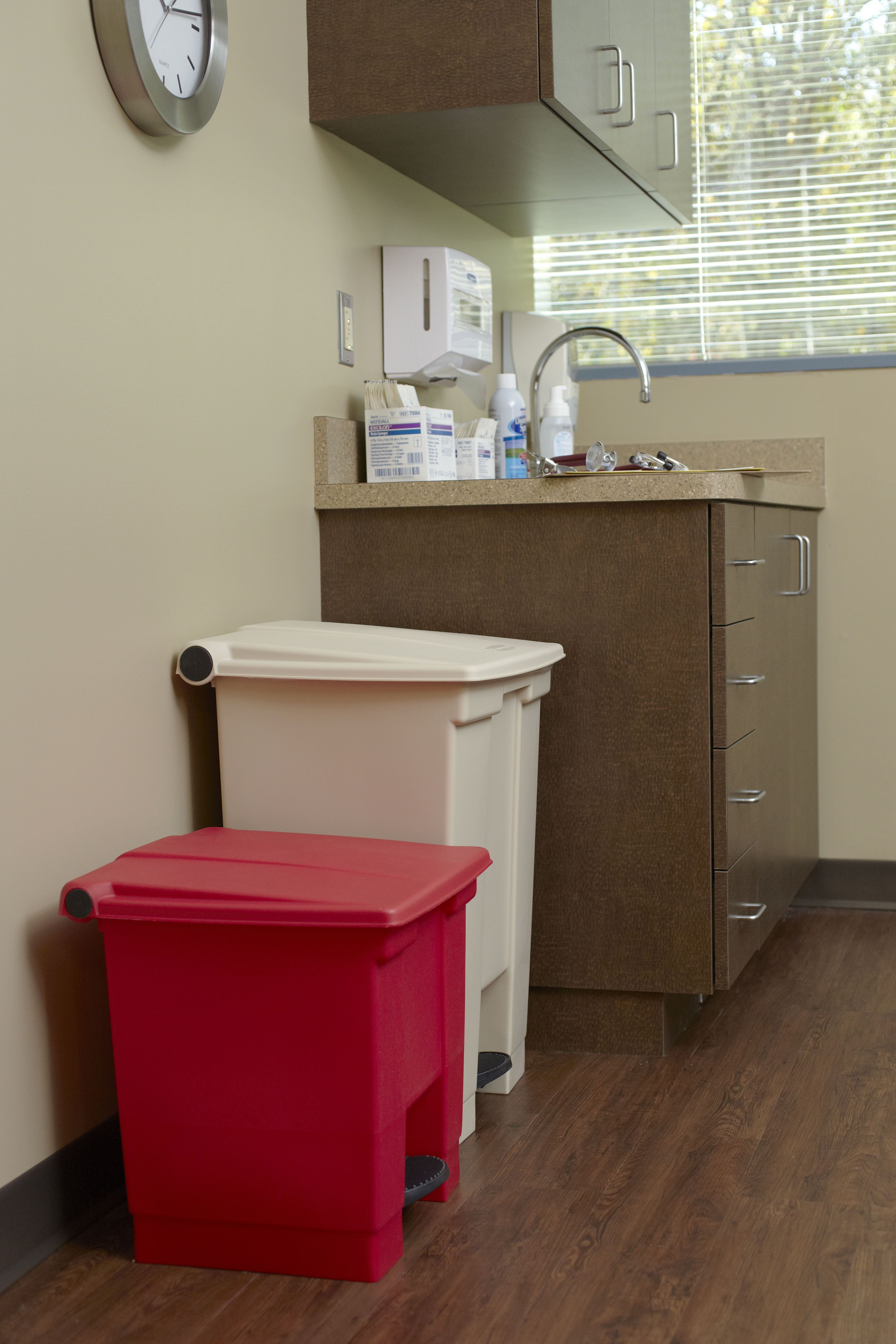 The Rubbermaid Commercial Step-On Container provides sanitary waste management.