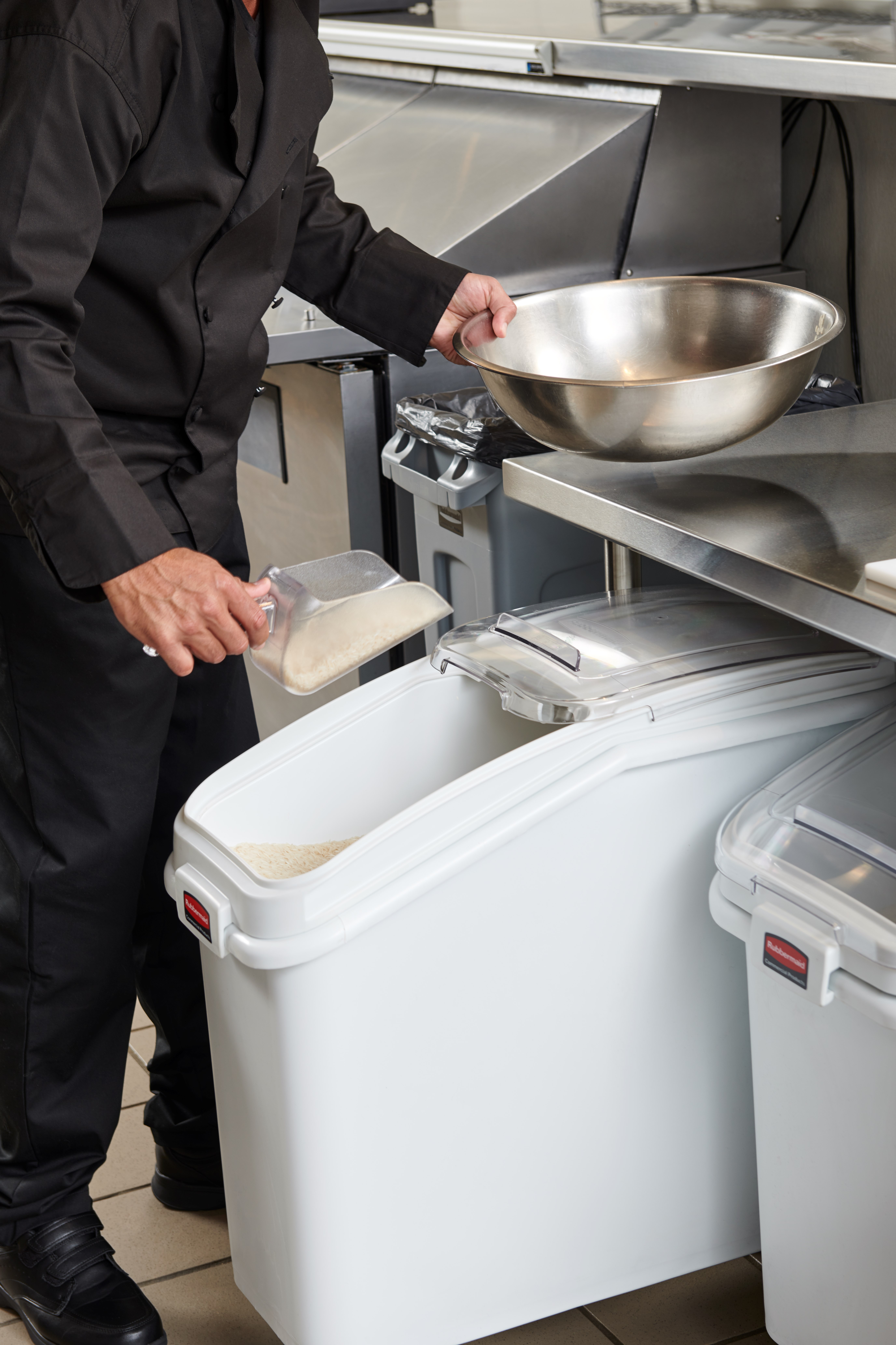 The Rubbermaid Commercial ProSave® Ingredient and Food Storage Mobile Bin is a bulk food storage container on wheels. With a slanted front, sliding opening, and 32-ounce scoop, these food storage containers make it easy to transport ingredients.
