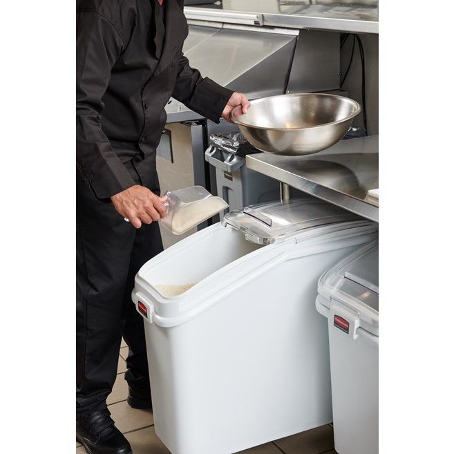 The Rubbermaid Commercial ProSave® Ingredient and Food Storage Mobile Bin is a bulk food storage container on wheels. With a slanted front, sliding opening, and 32-ounce scoop, these food storage containers make it easy to transport ingredients.