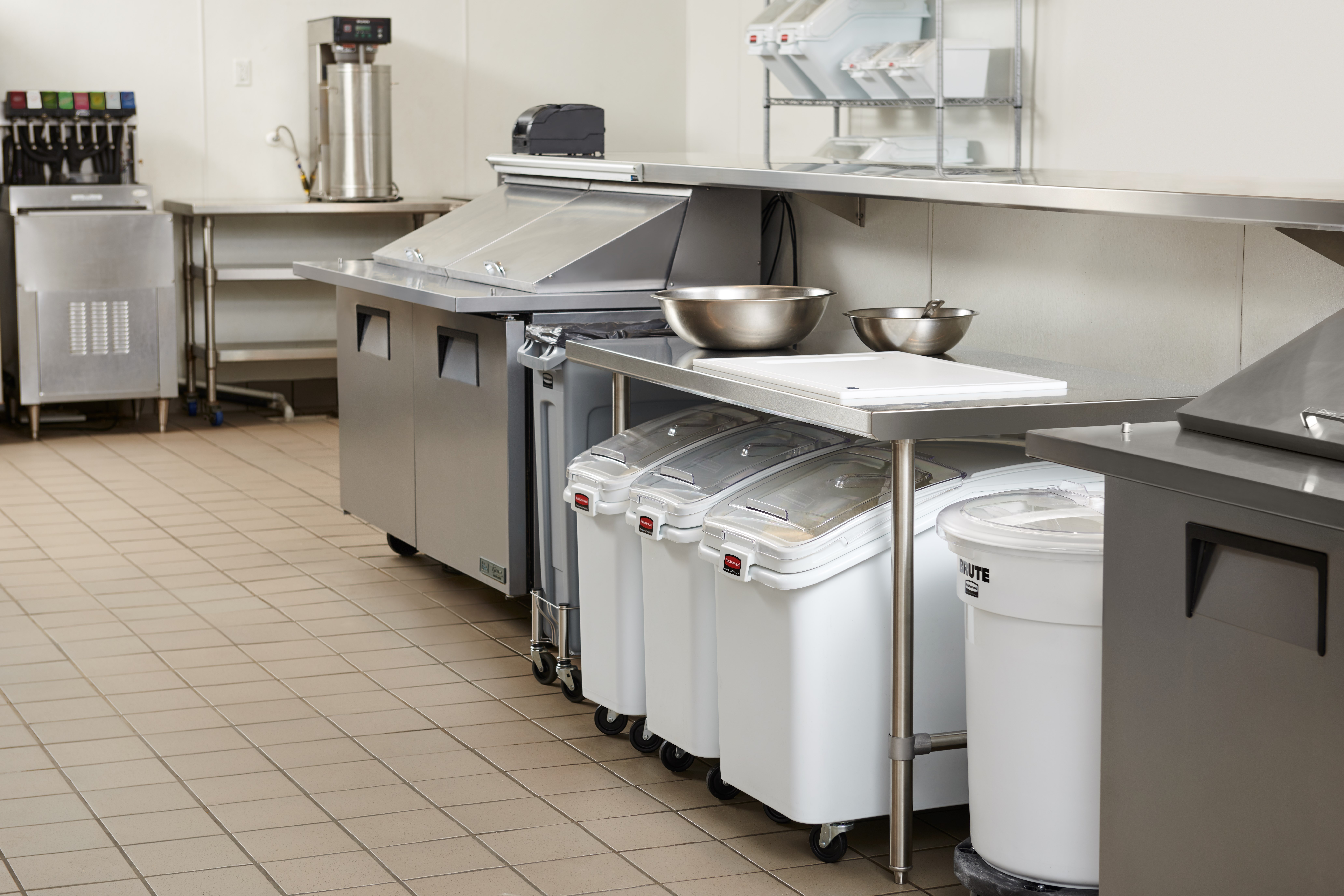 The Rubbermaid Commercial ProSave® Ingredient and Food Storage Mobile Bin is a bulk food storage container on wheels. With a slanted front, sliding opening, and 32-ounce scoop, these food storage containers make it easy to transport ingredients.