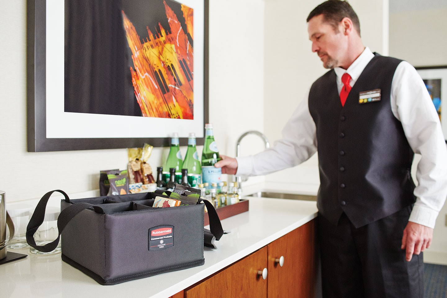 The Rubbermaid Commercial Executive Quick Cart Caddy is great for organizing amenities with its adjustable and removable dividers.