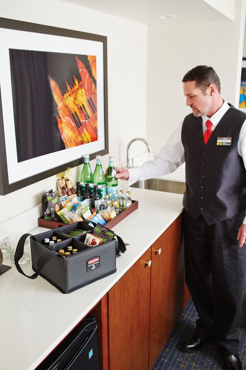 The Rubbermaid Commercial Executive Quick Cart Caddy is great for organizing amenities with its adjustable and removable dividers.