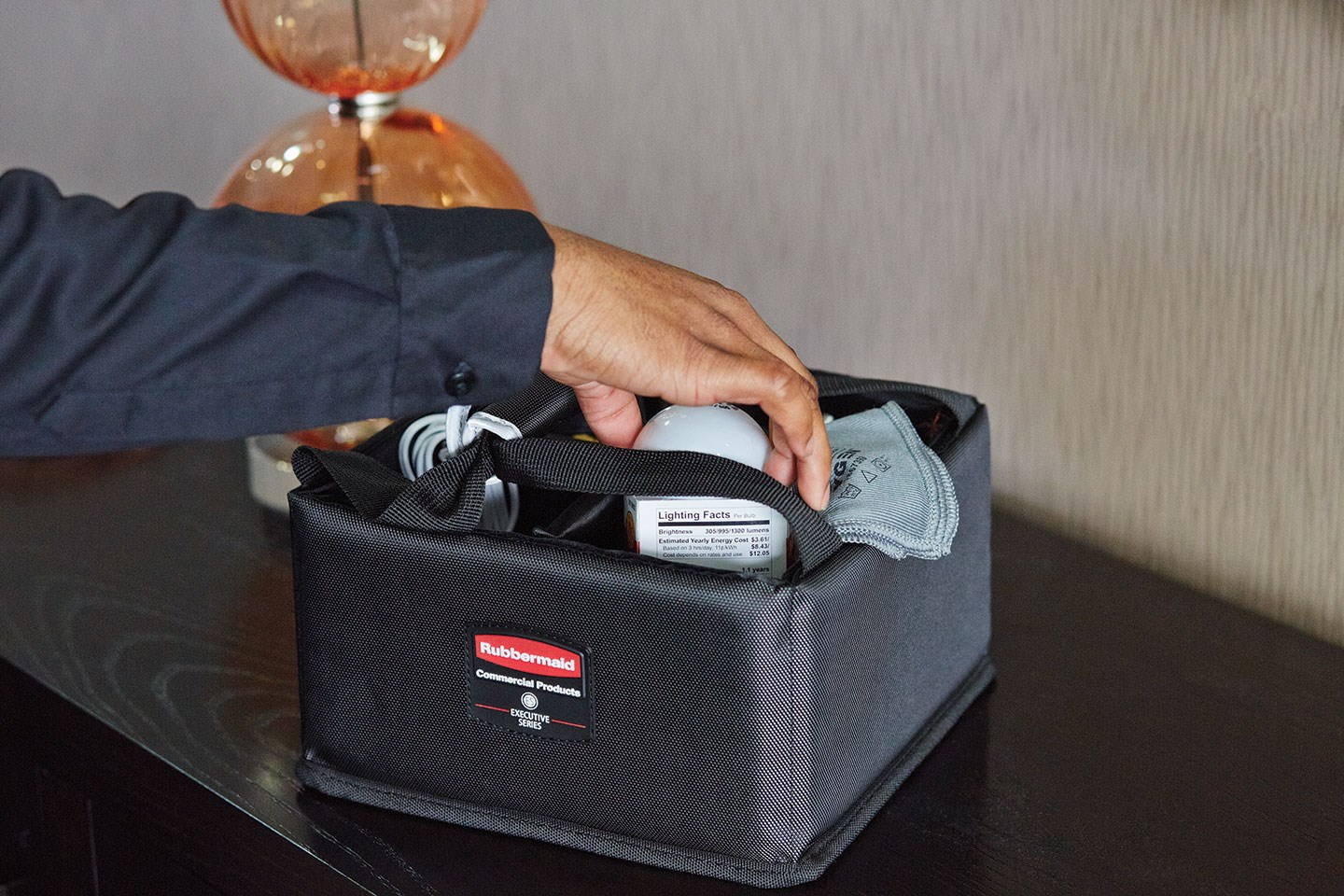 The Rubbermaid Commercial Executive Quick Cart Caddy is great for organizing amenities with its adjustable and removable dividers.