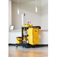 The Traditional Janitorial Cleaning Cart with zippered yellow vinyl bag collects waste and transports tools for efficient cleaning.
