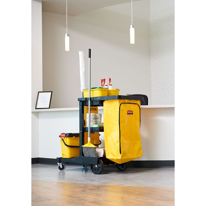 The Traditional Janitorial Cleaning Cart with zippered yellow vinyl bag collects waste and transports tools for efficient cleaning.