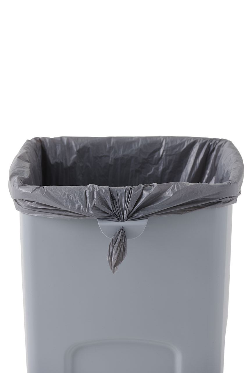 Stationary containers provide convenient central collection sites for multiple work stations or areas.