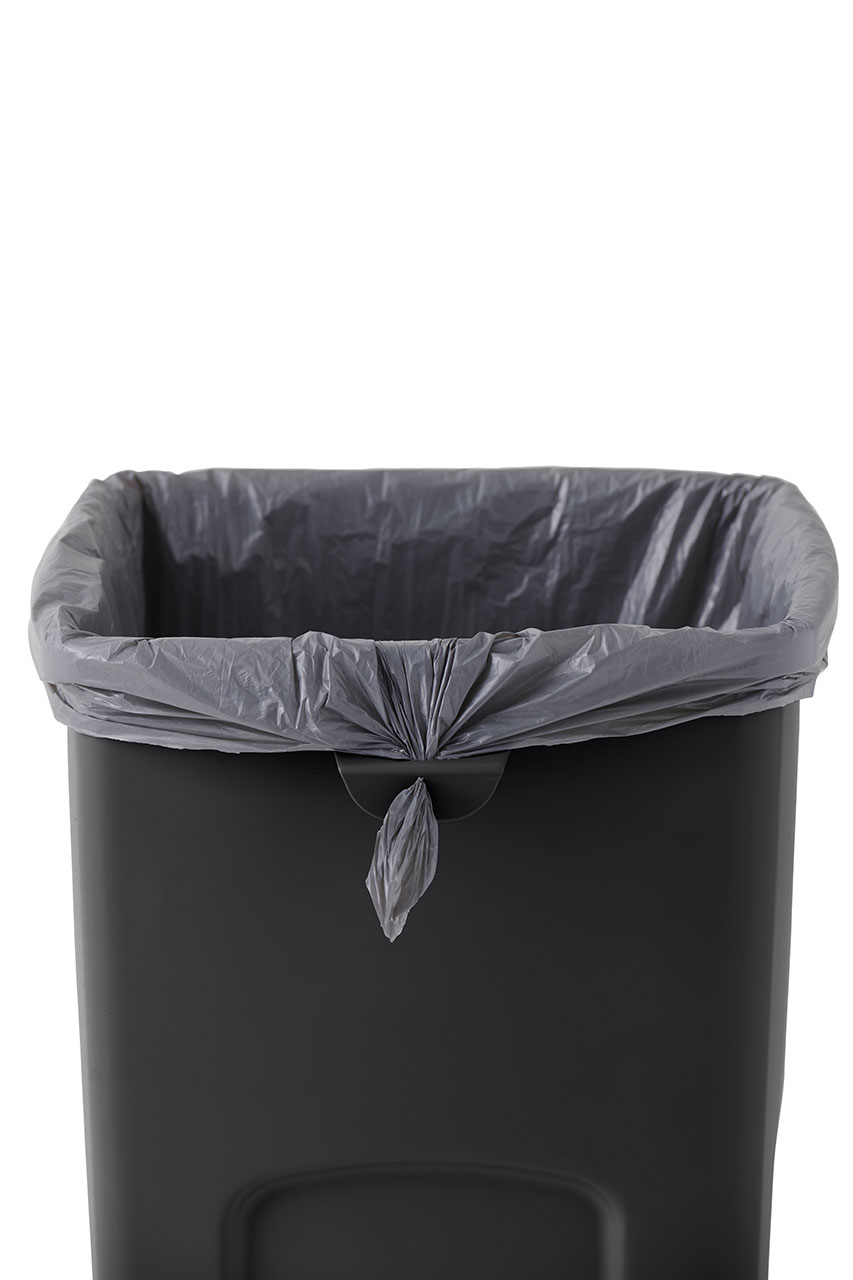 Stationary containers provide convenient central collection sites for multiple work stations or areas.