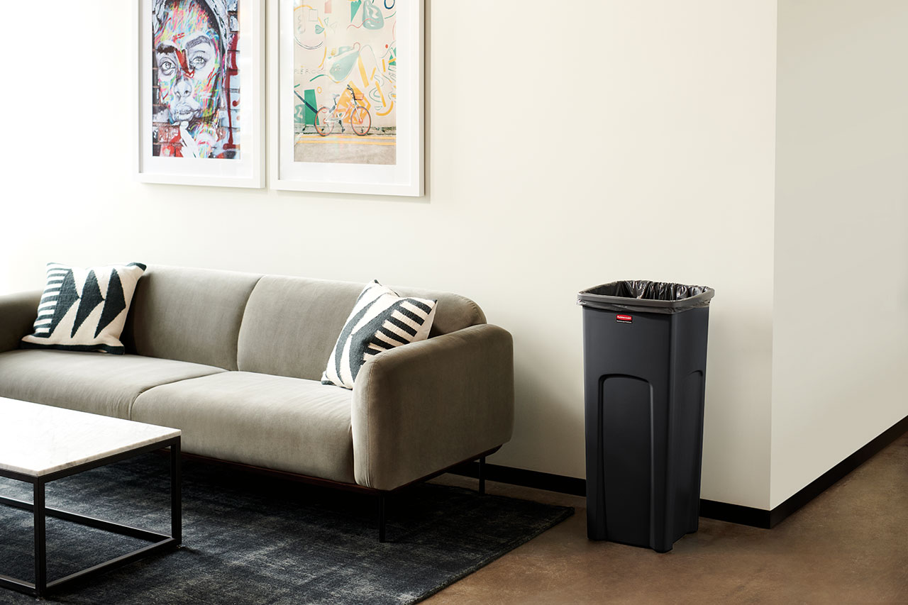 Stationary containers provide convenient central collection sites for multiple work stations or areas.