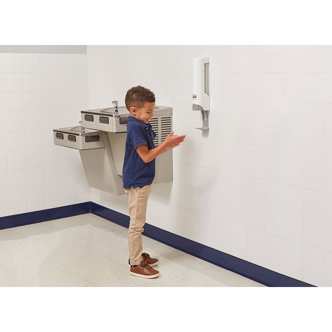 The CrackleClean™ Dispenser is a manual, wall-mounted system that dispenses a foaming gel formula that crackles when dispensed, providing an interactive and engaging experience that encourages users to sanitize more frequently.
