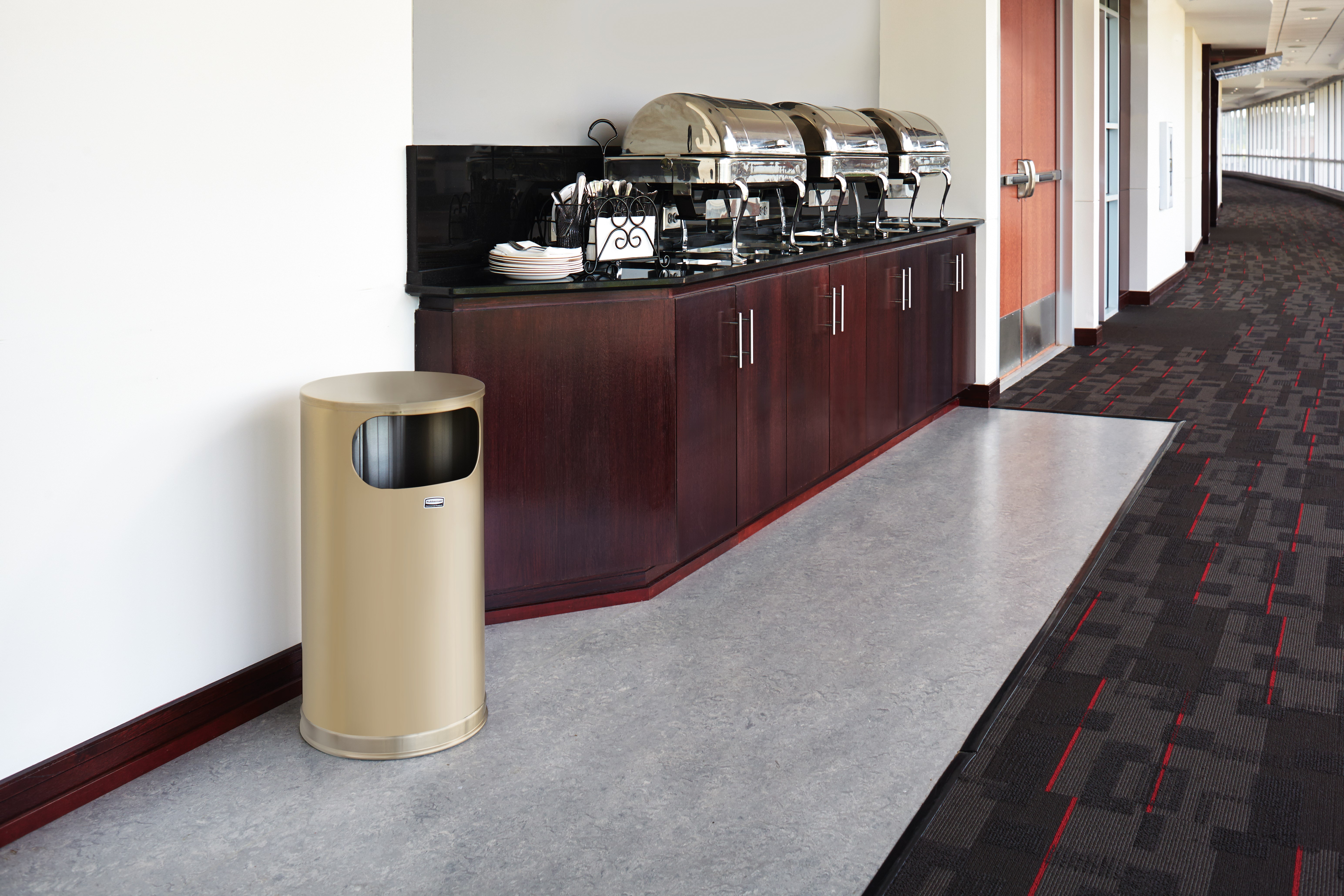 The Metallic Series 12 Gallon FGSO16 Indoor Waste Container is made from heavy-gauge, fire-safe steel with a sleek design that blends nicely with upscale interiors.