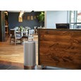 The Metallic Series 15 Gallon FGCC16 Indoor Waste Container has a sleek design that blends nicely with upscale interiors.