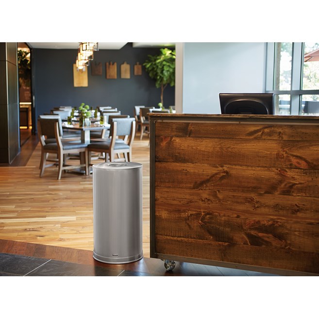 The Metallic Series 15 Gallon FGCC16 Indoor Waste Container has a sleek design that blends nicely with upscale interiors.