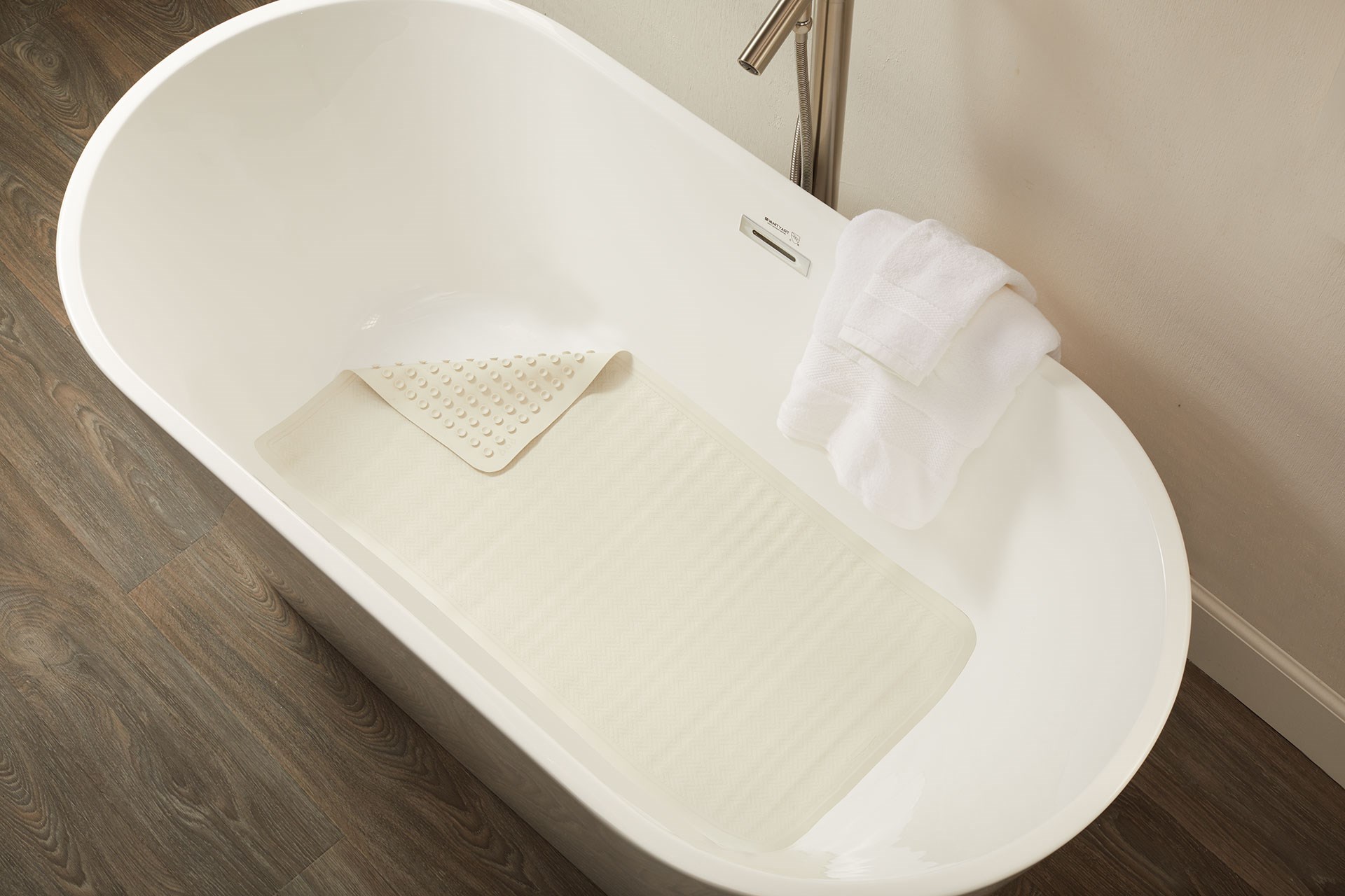 Safti-Grip® Bath Mat is perfect for a shower stall or bathtub. Suction-backed to stay firmly in place.
