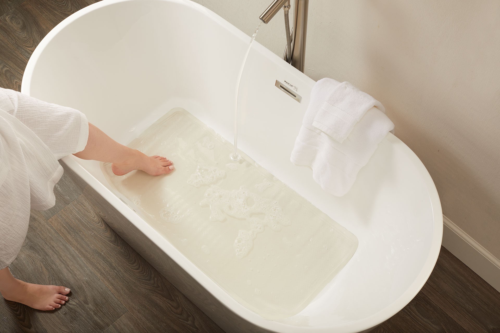 Safti-Grip® Bath Mat is perfect for a shower stall or bathtub. Suction-backed to stay firmly in place.