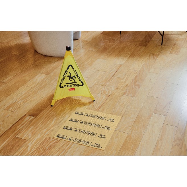 Collapsible sign automatically deploys when removed from wall-mounted storage tube. Multilingual safety communication utilizes ANSI/OSHA-compliant color and graphics