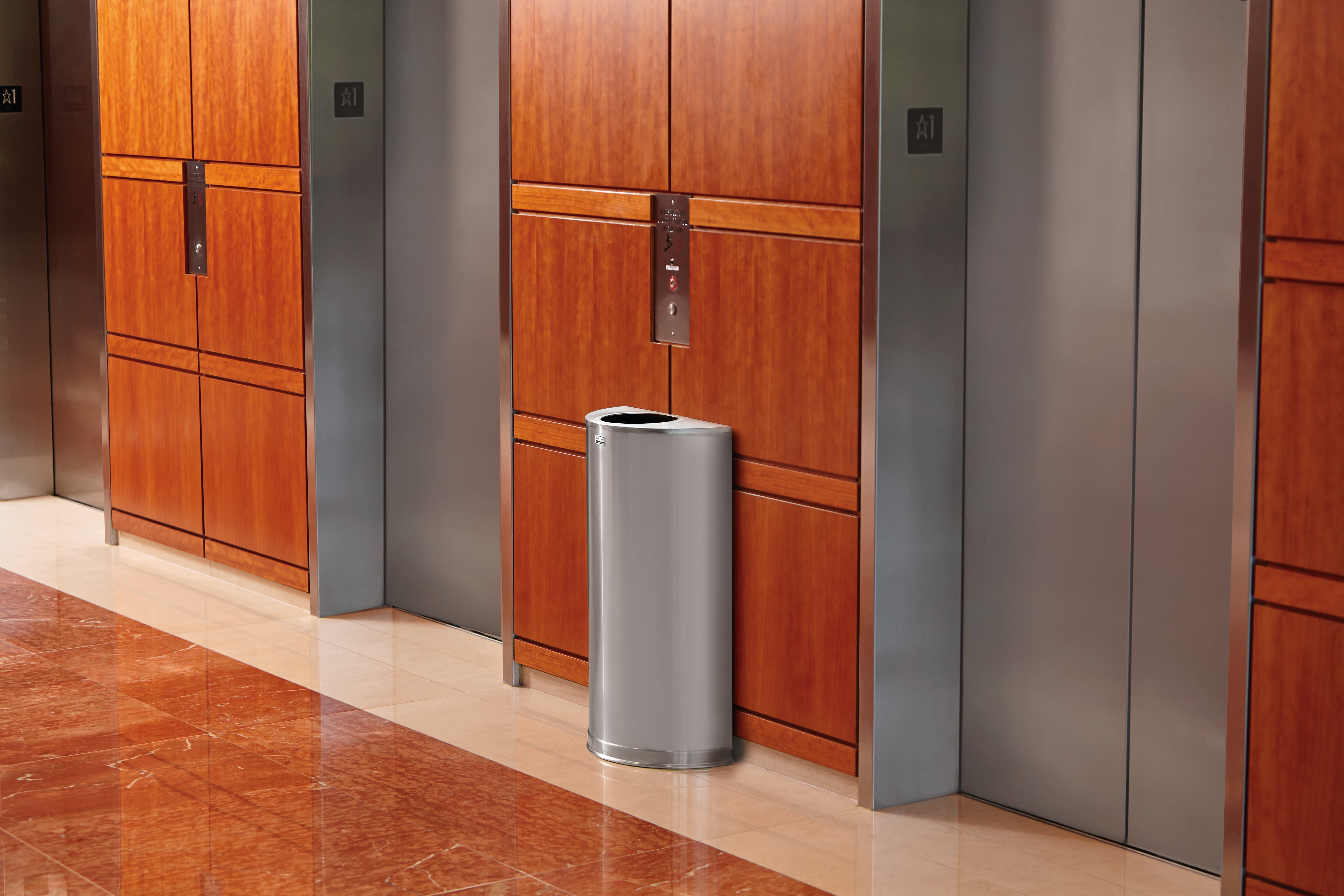 The sleek Half Round 45 l FGSH12 Decorative Half-Round Indoor Waste Container has a contemporary perforated designed to seamlessly and beautifully blend with modern facilities and environments.