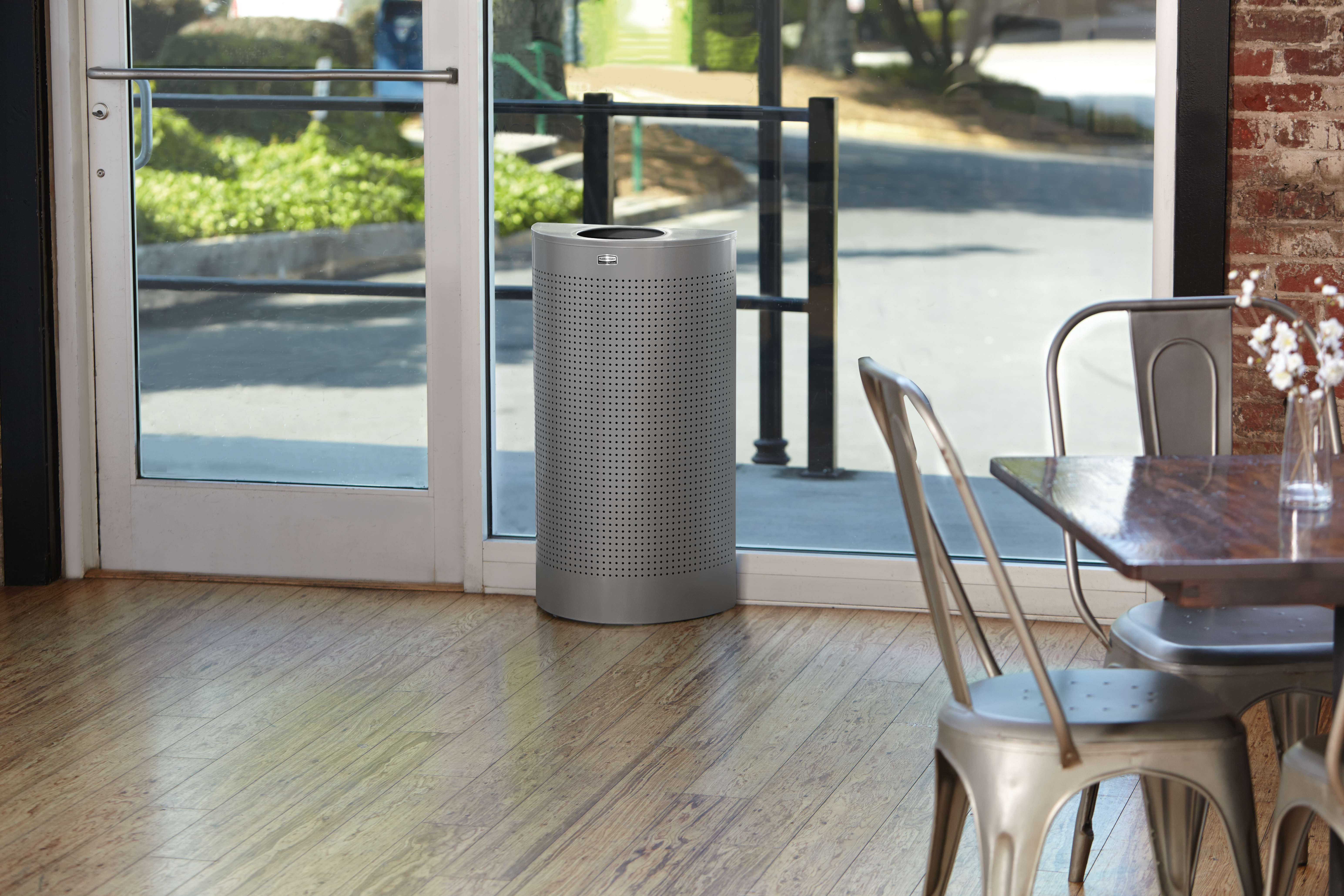 The sleek Half Round 45 l FGSH12 Decorative Half-Round Indoor Waste Container has a contemporary perforated designed to seamlessly and beautifully blend with modern facilities and environments.