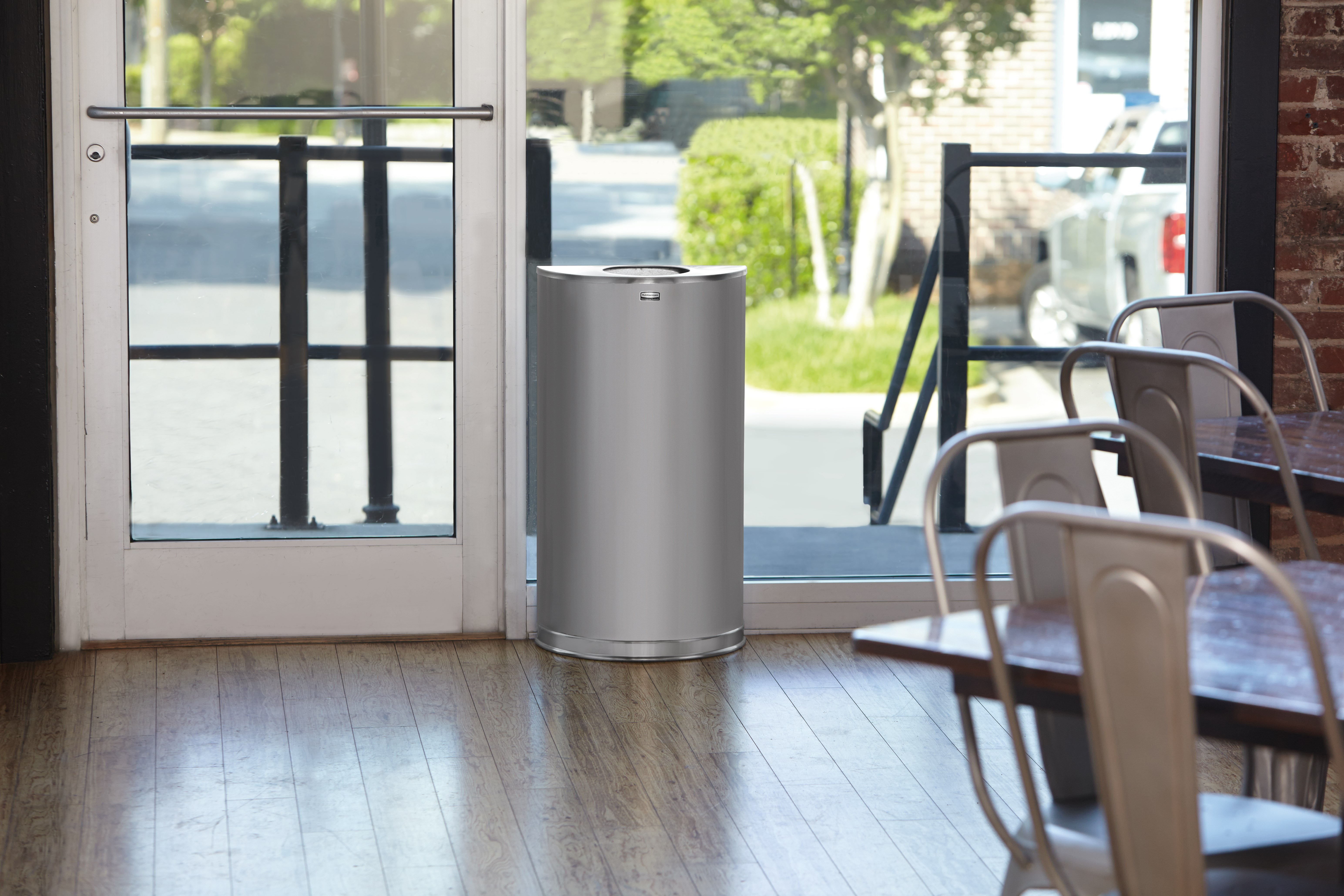 The Half Rounds Series indoor decorative waste container fits flush against walls to conserve space and reduce obstructions in high-traffic areas. The sleek and functional design of this receptacle blends seamlessly with upscale and modern indoor facilities.
