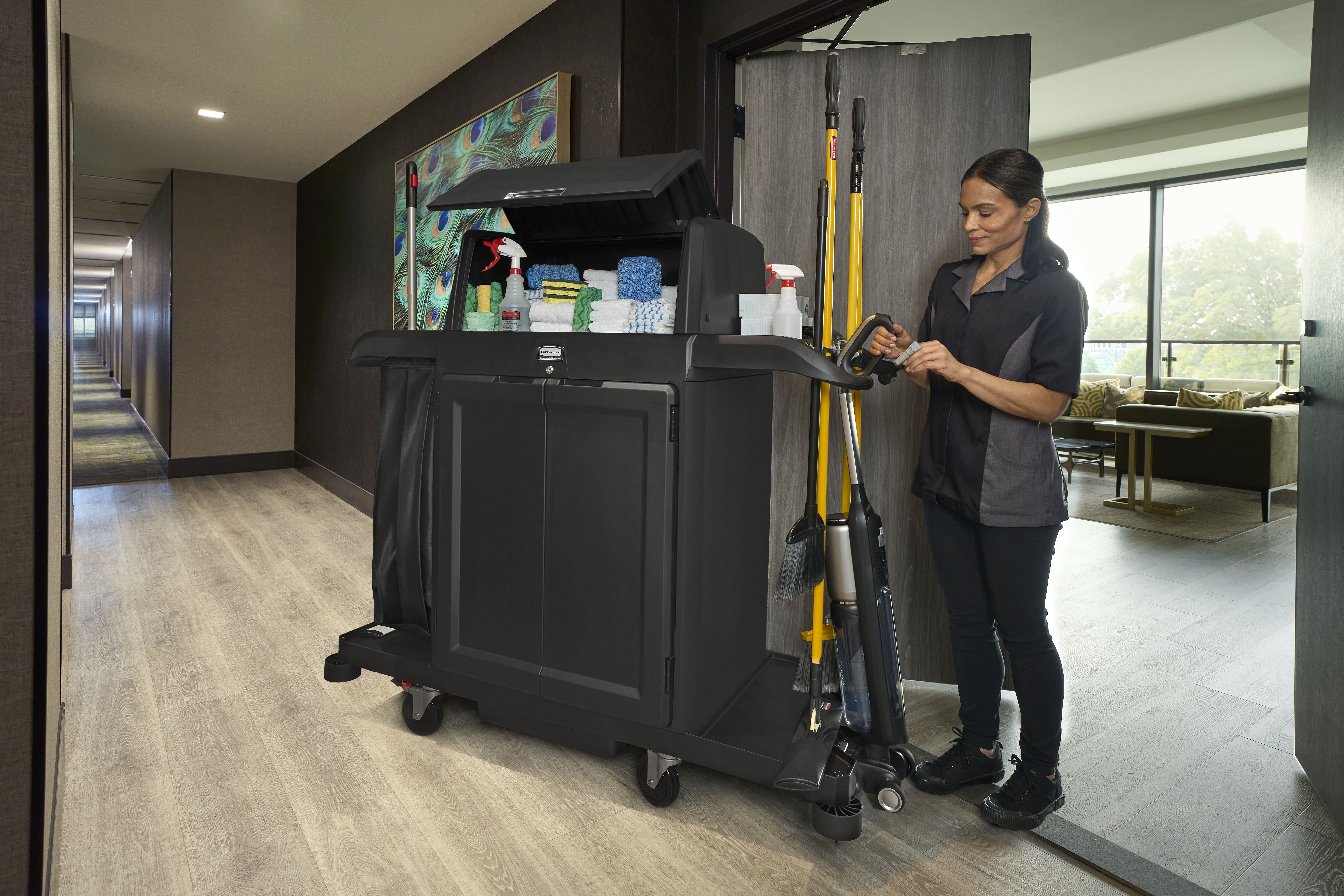 The Vacuum Holder helps to secure vacuums in place on Rubbermaid Commercial Product's Housekeeping Carts.