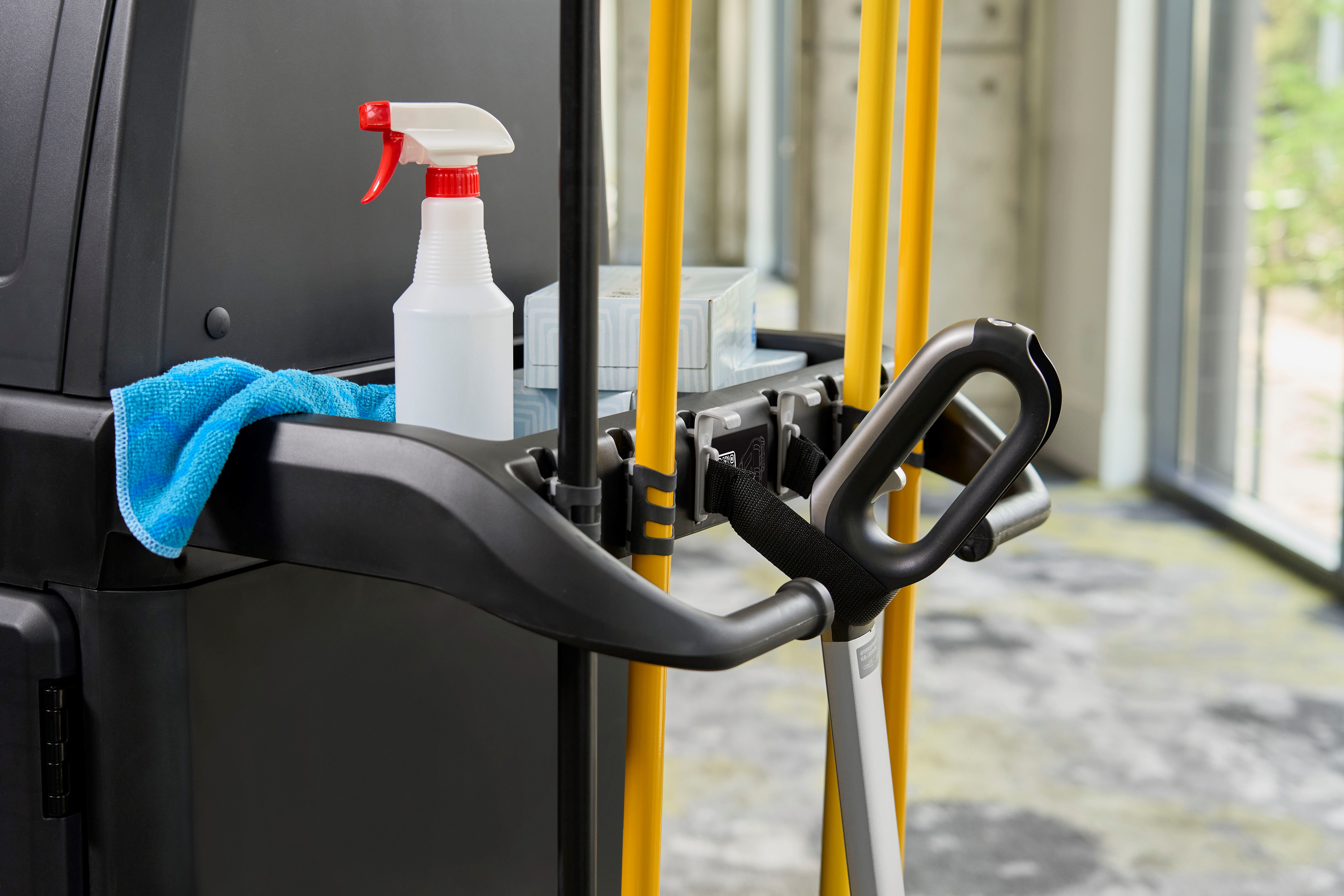 The Vacuum Holder helps to secure vacuums in place on Rubbermaid Commercial Product's Housekeeping Carts.