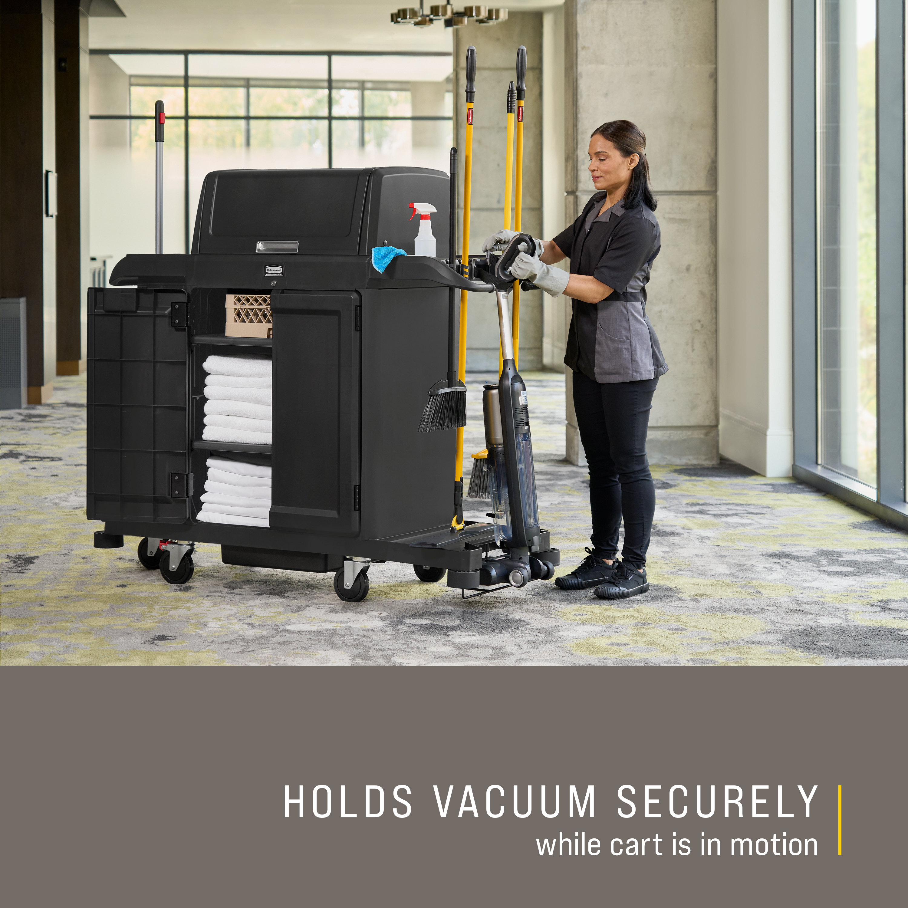 The Vacuum Holder helps to secure vacuums in place on Rubbermaid Commercial Product's Housekeeping Carts.