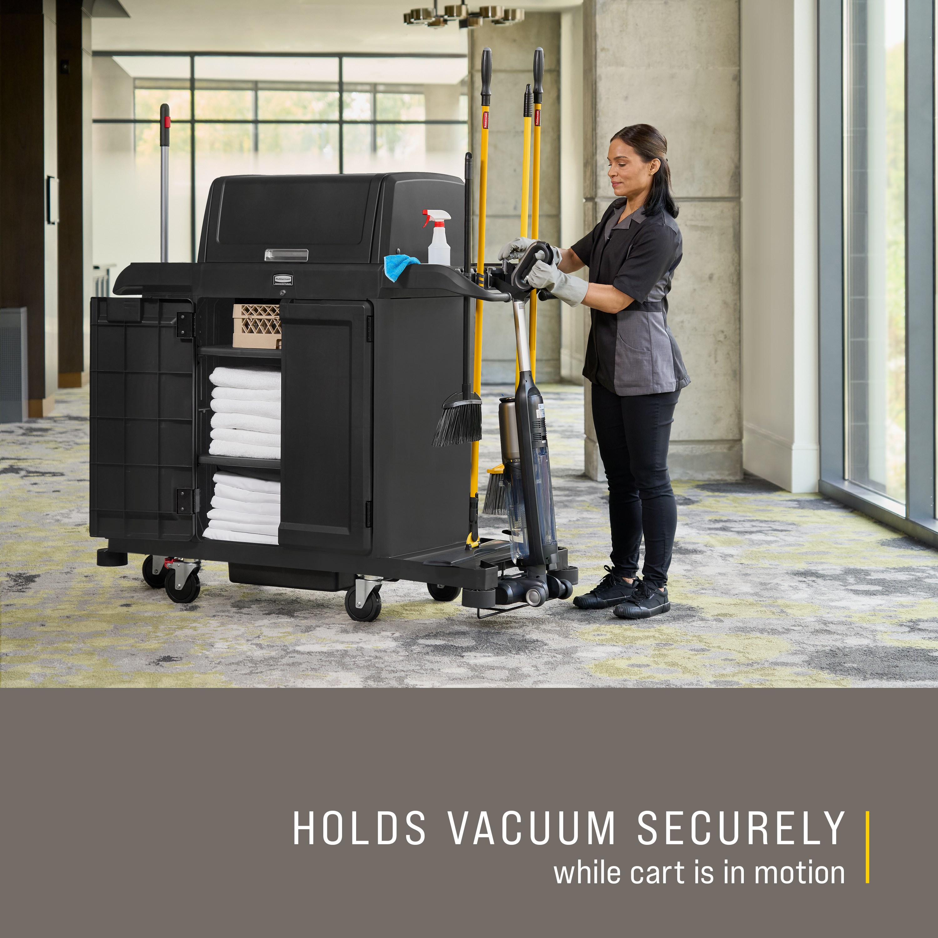 The Vacuum Holder helps to secure vacuums in place on Rubbermaid Commercial Product's Housekeeping Carts.