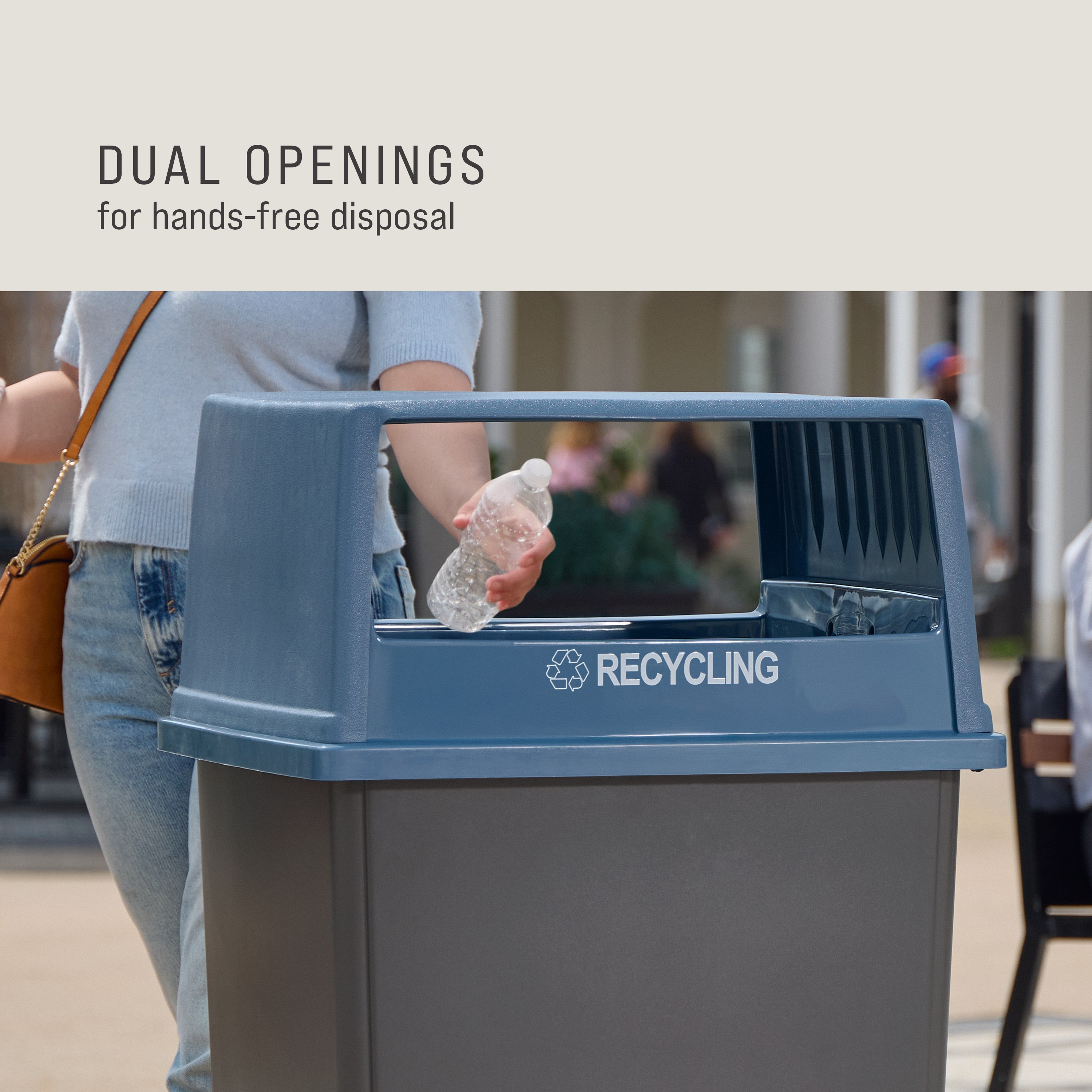 The Rubbermaid Commercial Products® Fulfill Hooded Recycling Top for 56 gallon containers features two large openings for hands-free recycling disposal.