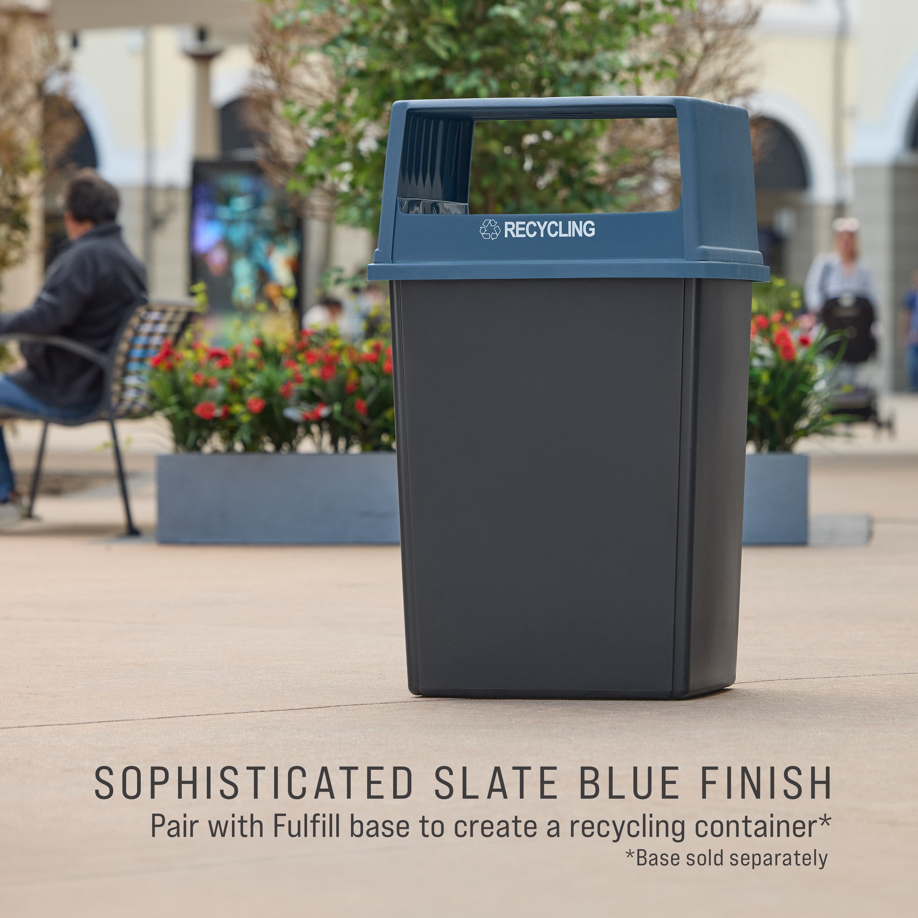 The Rubbermaid Commercial Products® Fulfill Hooded Recycling Top for 56 gallon containers features two large openings for hands-free recycling disposal.