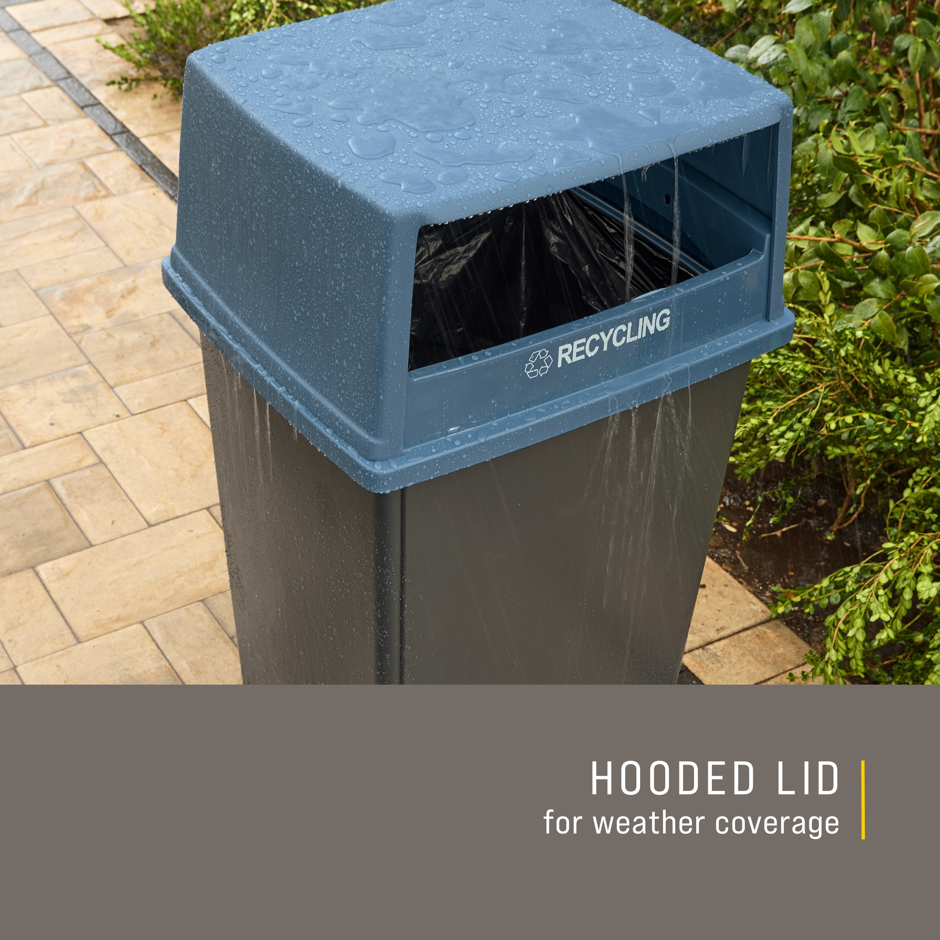 The Rubbermaid Commercial Products® Fulfill Hooded Recycling Top for 56 gallon containers features two large openings for hands-free recycling disposal.