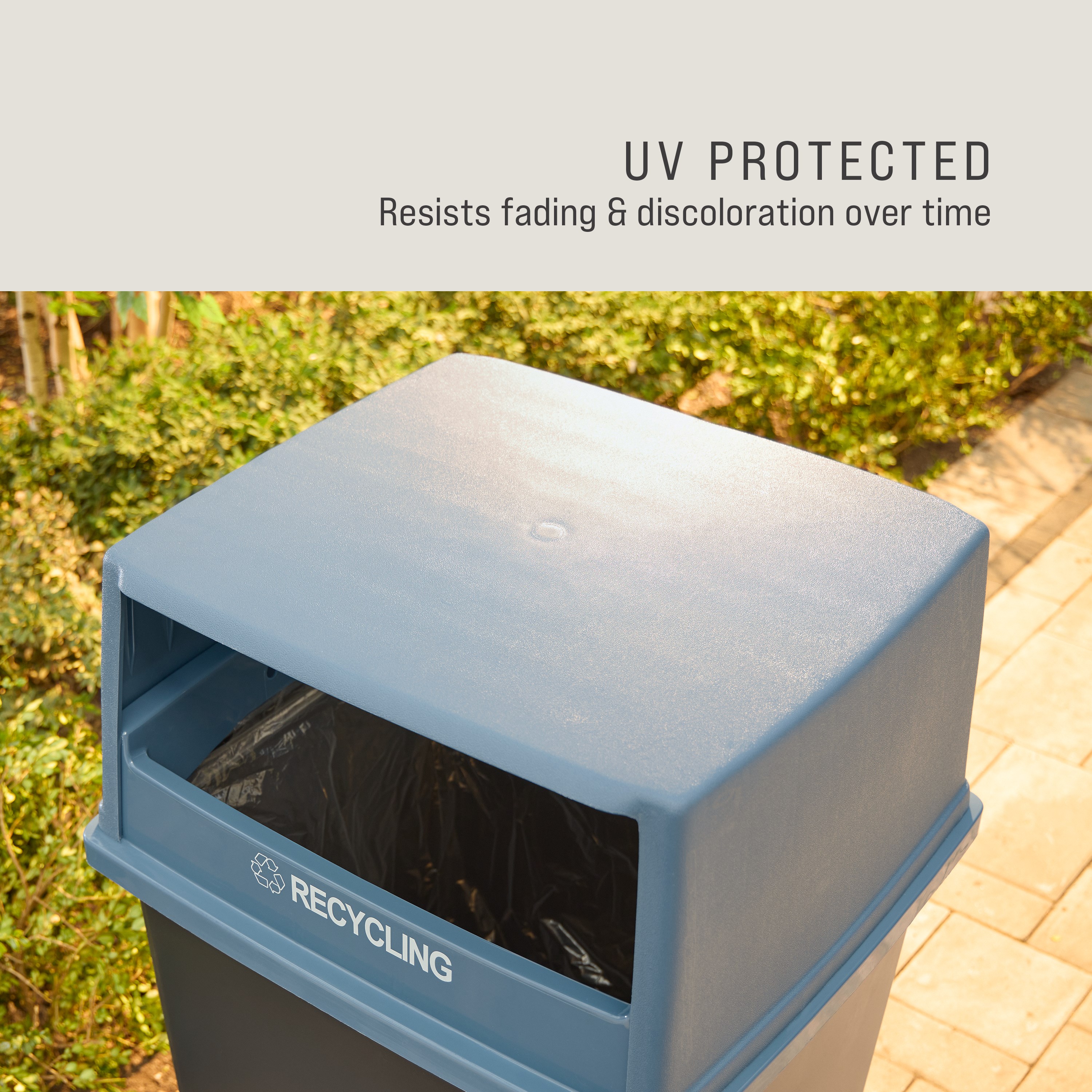The Rubbermaid Commercial Products® Fulfill Hooded Recycling Top for 56 gallon containers features two large openings for hands-free recycling disposal.