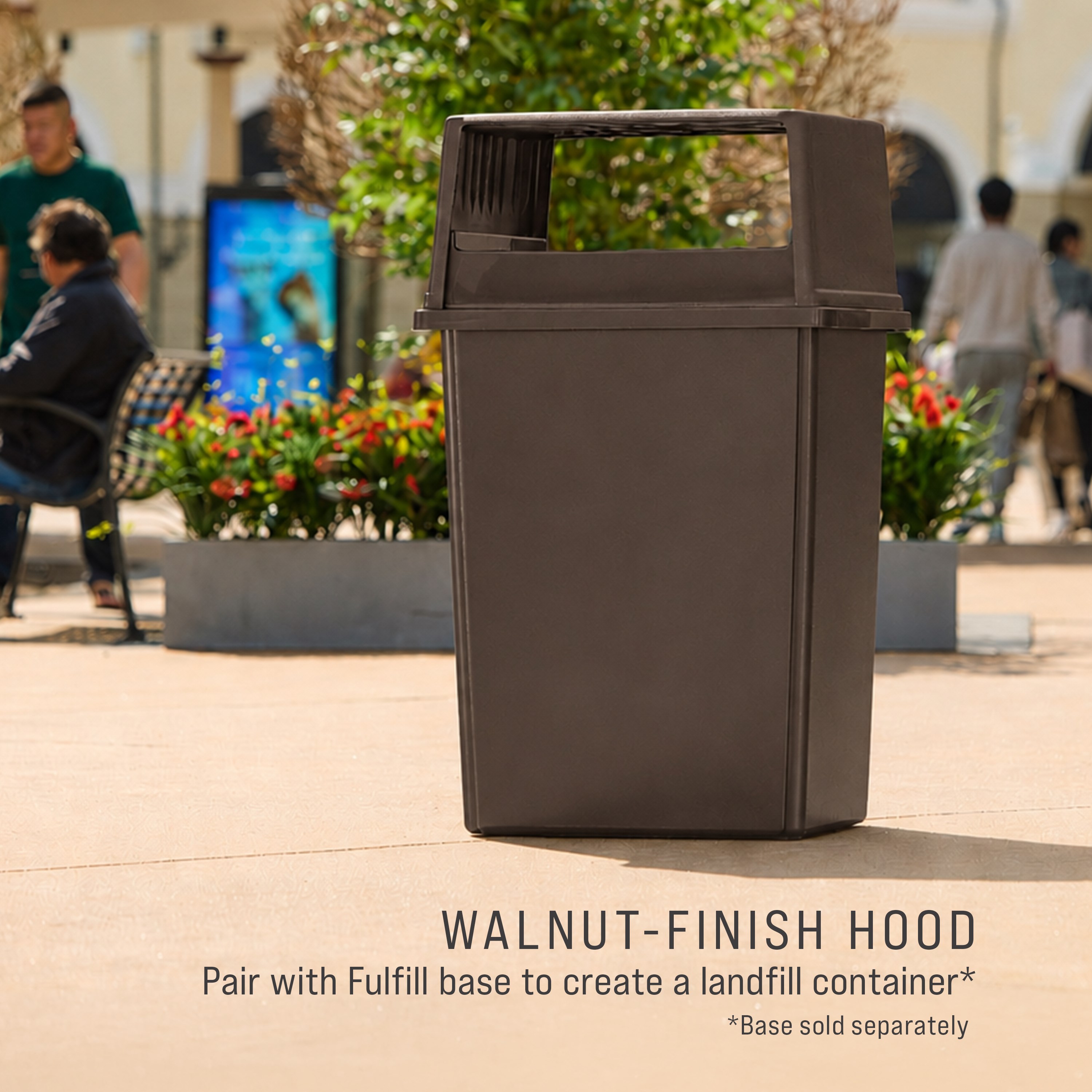 The Rubbermaid Commercial Products® Fulfill Hooded Landfill Top for 56 gallon containers features two large openings for hands-free landfill disposal. The updated walnut color blends seamlessly with a variety of spaces.