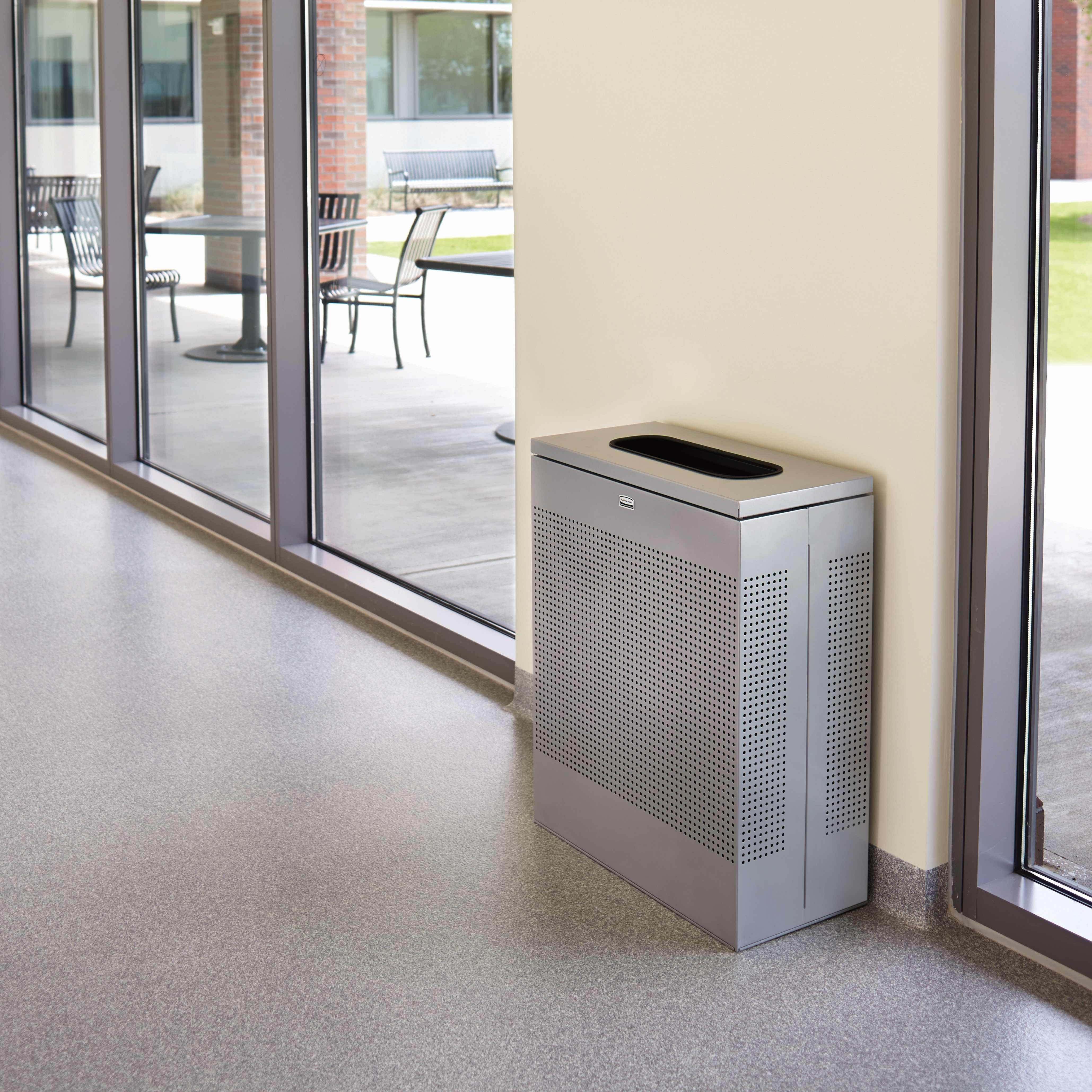 The sleek Silhouettes 22.5 Gallon FGSR18 Decorative Rectangle Indoor Waste Container has a contemporary perforated pattern designed to seamlessly and beautifully blend with modern facilities and environments. High-quality materials and craftsmanship ensure containers can withstand the rigors of everyday use.