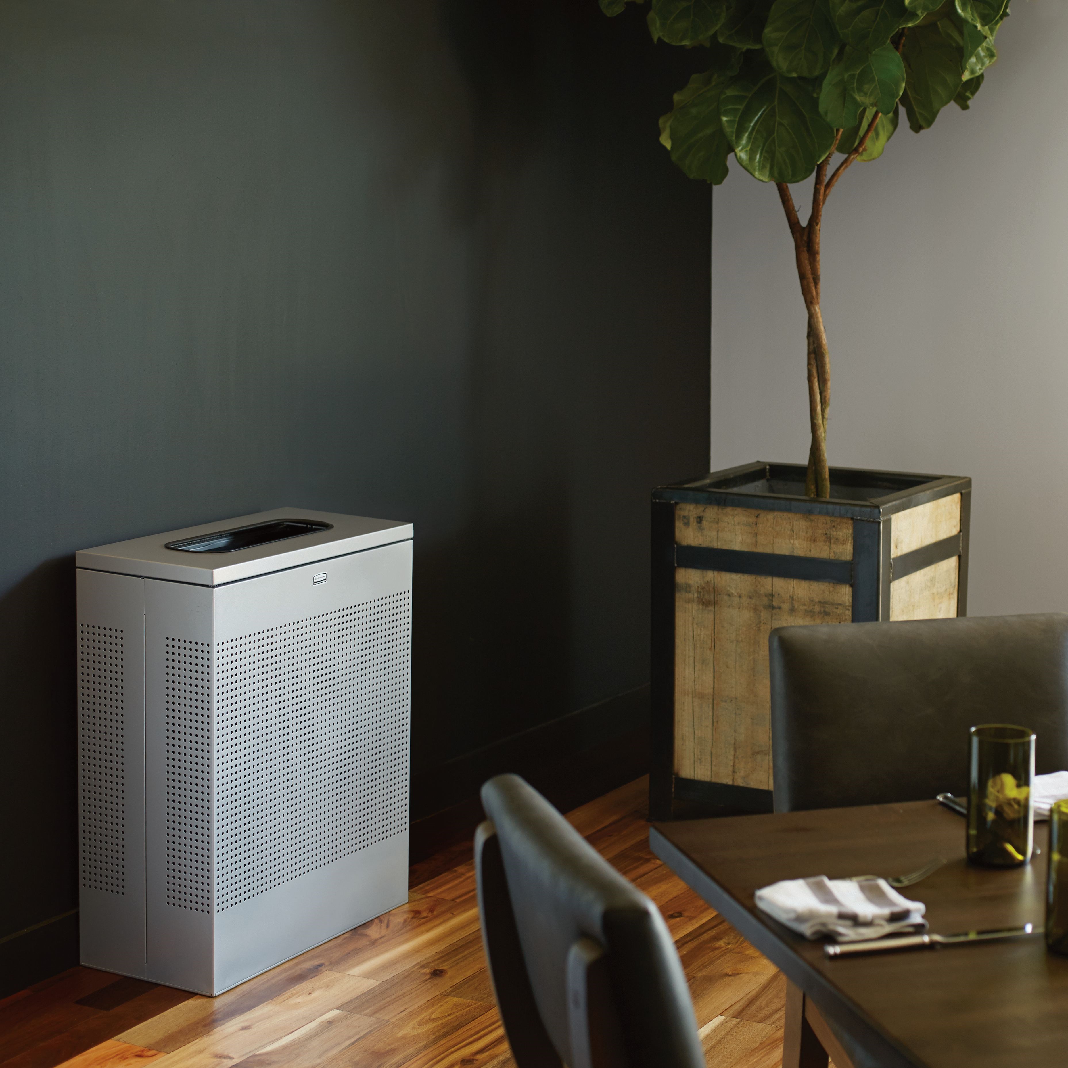 The sleek Silhouettes 22.5 Gallon FGSR18 Decorative Rectangle Indoor Waste Container has a contemporary perforated pattern designed to seamlessly and beautifully blend with modern facilities and environments. High-quality materials and craftsmanship ensure containers can withstand the rigors of everyday use.