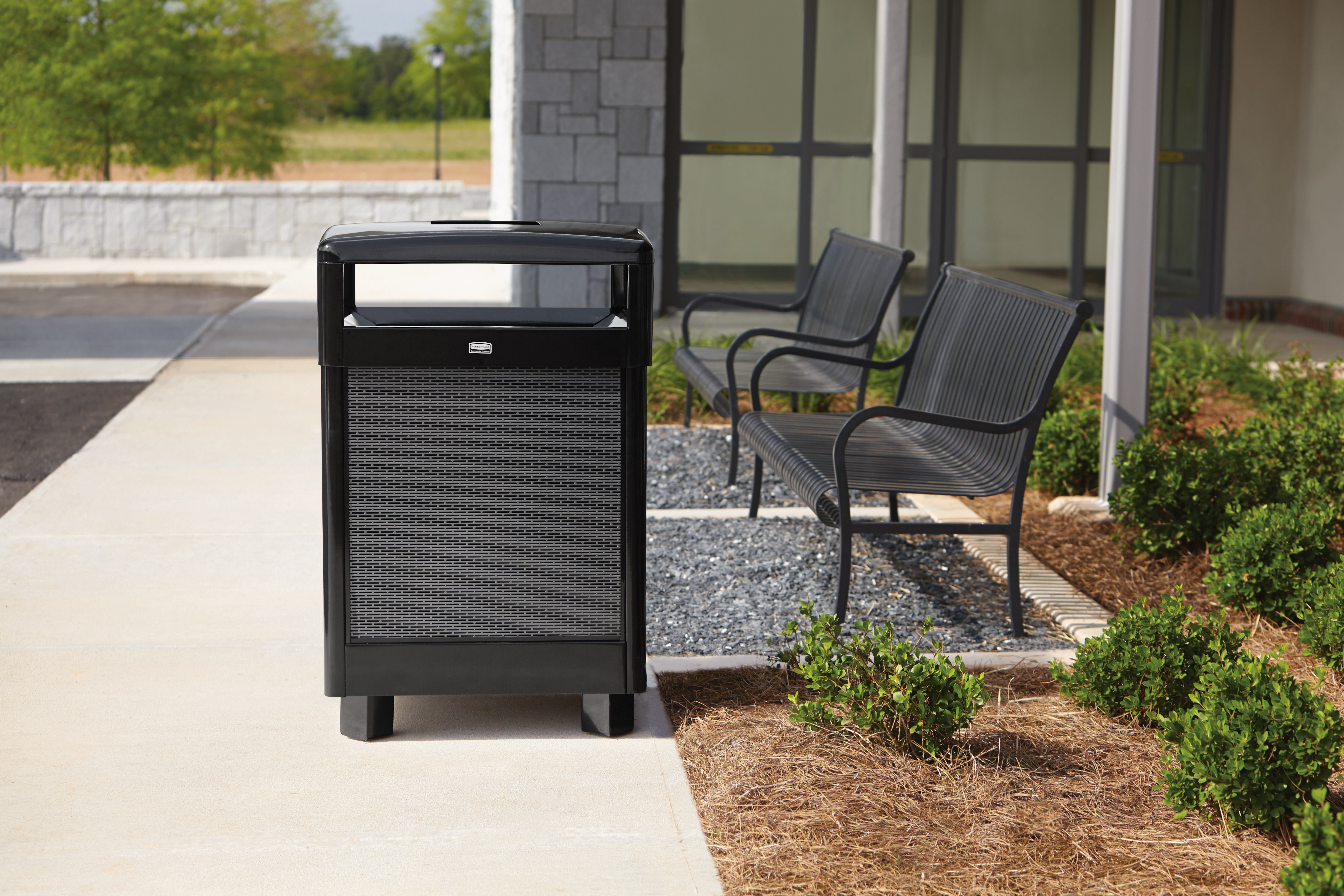 The Dimension Series decorative outdoor waste container's perforated steel panels create an upscale, dimensional look that complements contemporary outdoor enviornments.