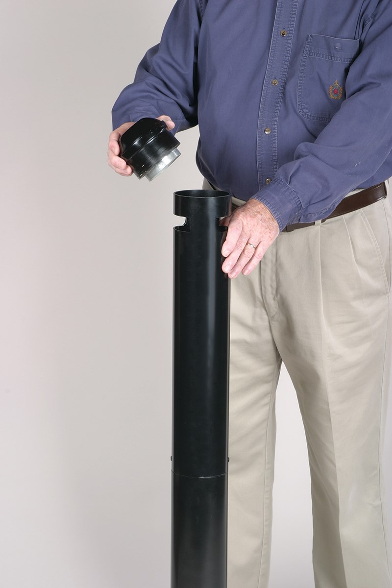 The Smoker's Pole is a simple, space-saving solution for controlling smokers' waste.
