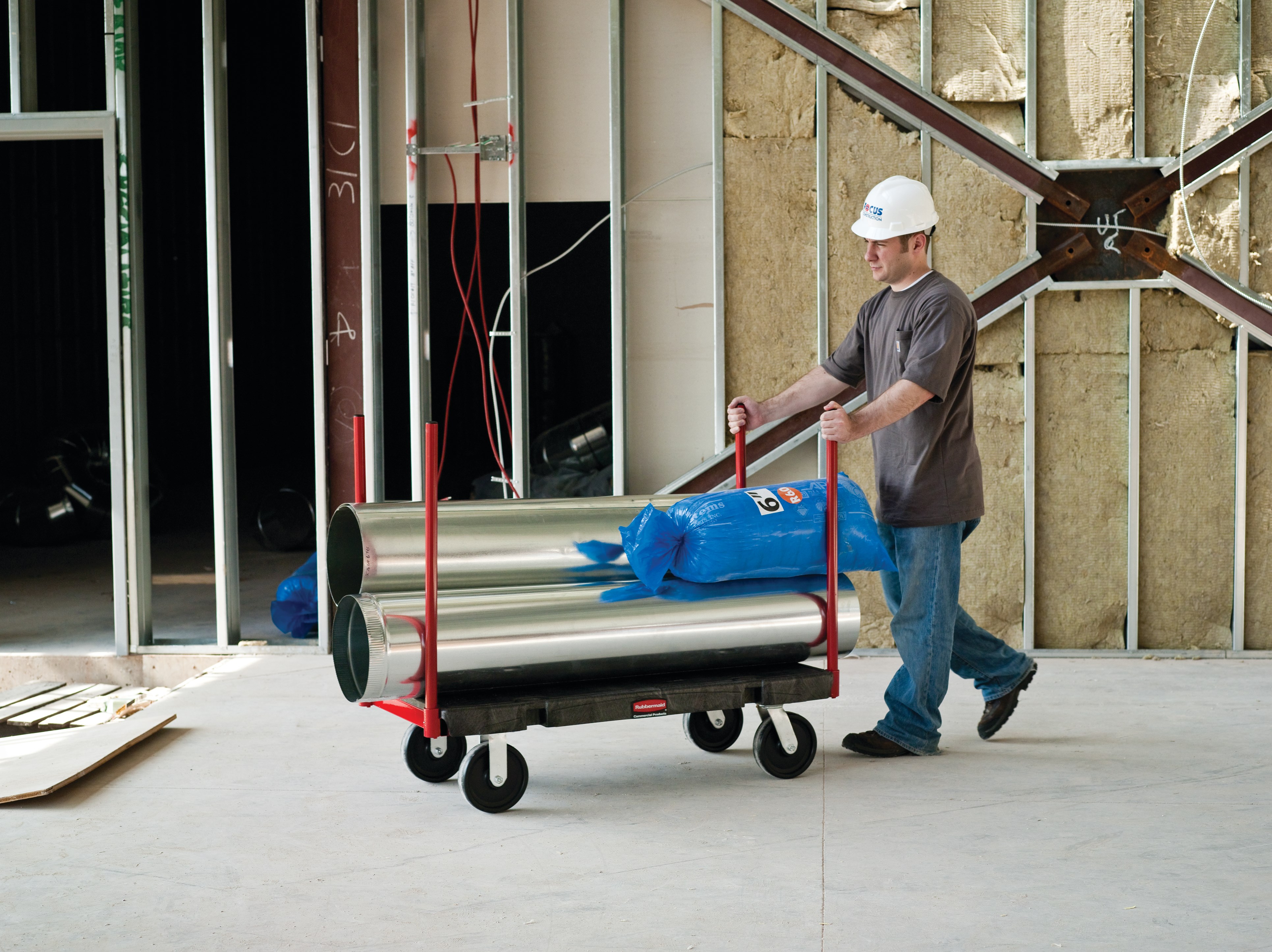 The Rubbermaid Commercial Stanchion Platform Truck 24"X48" with 8"POLYOLEFIN casters, 2500 lb. capacity