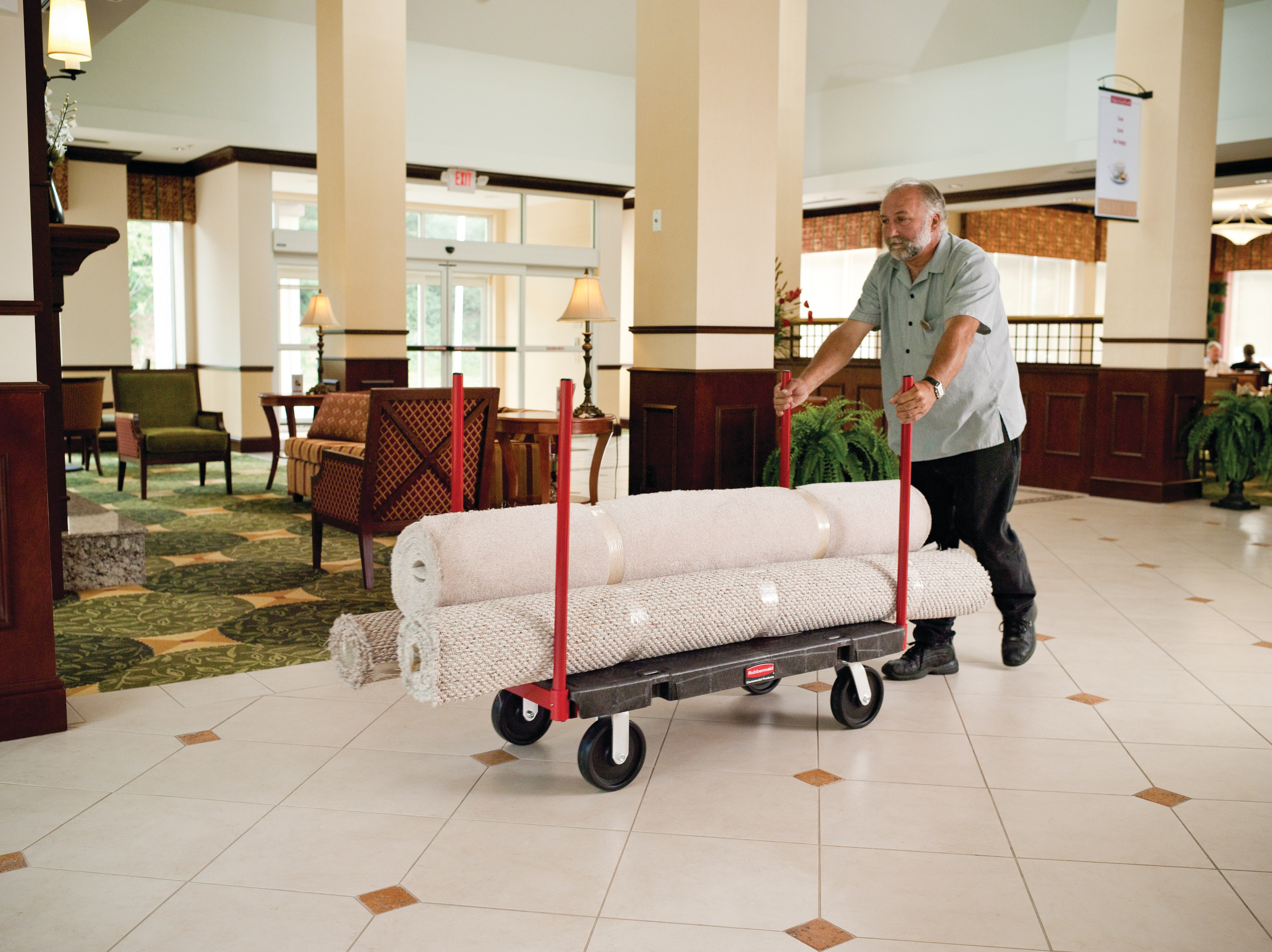 The Rubbermaid Commercial Stanchion Platform Truck 24"X48" with 8"POLYOLEFIN casters, 2500 lb. capacity