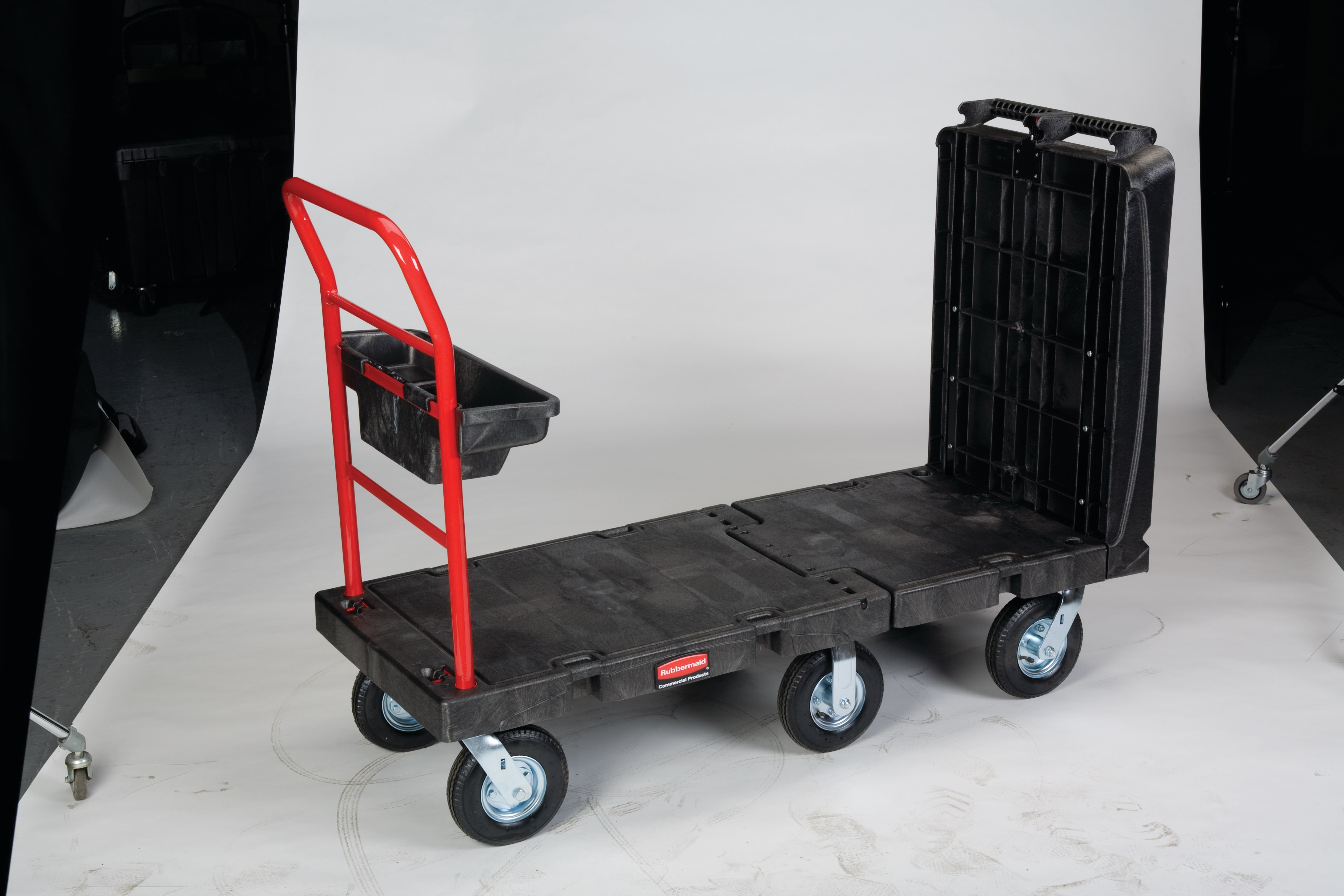 The Rubbermaid Commercial Convertible Platform Truck 24"X52" with 8"PNEUMATIC casters 750 lb. capacity as cart, 1000 lb. capacity as platform