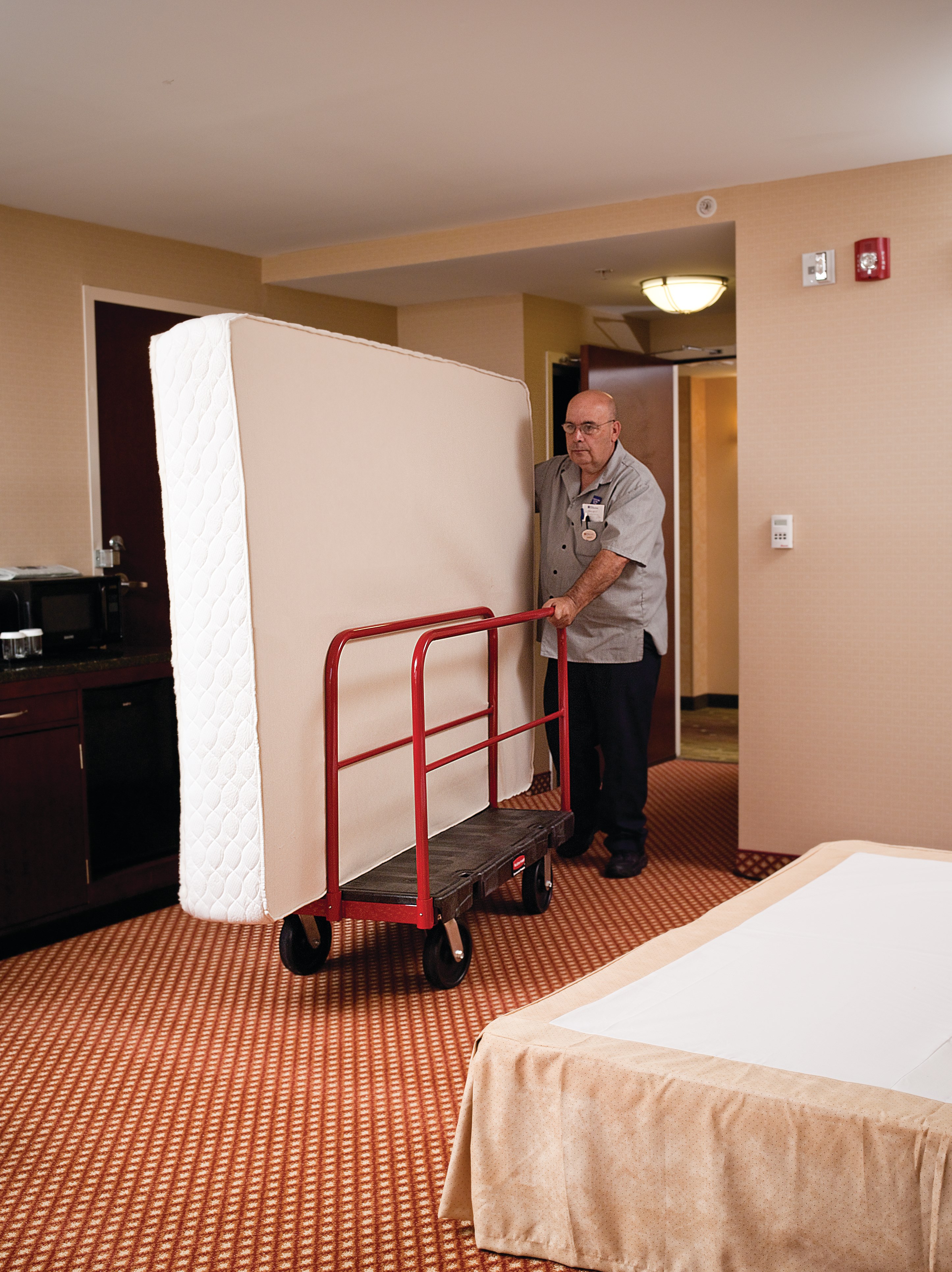 The Rubbermaid Commercial Sheet and Panel Truck has a 2,000-pound capacity and features built-in tie-down slots to secure loads while moving them and a textured surface greatly reduces slippage.