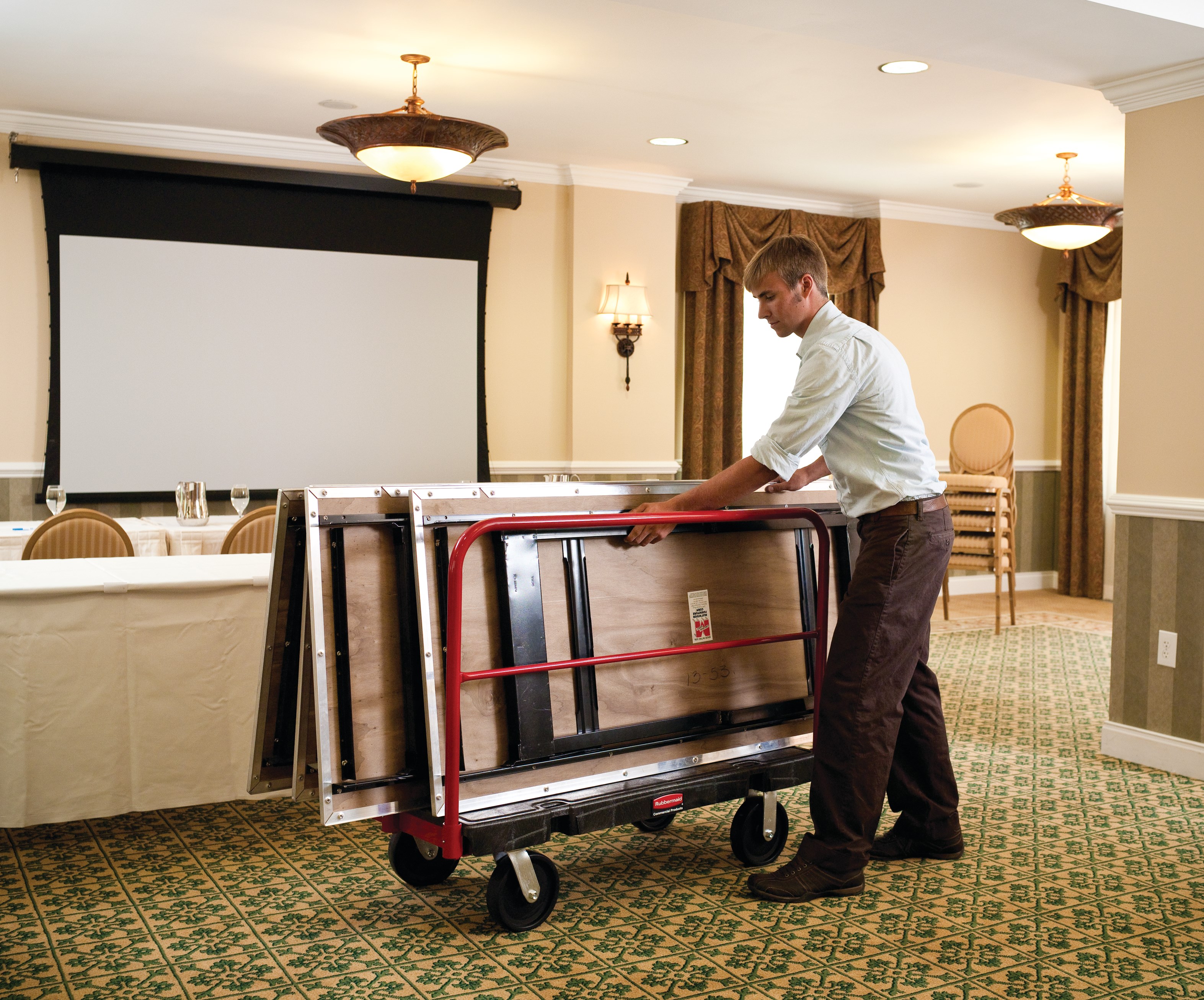 The Rubbermaid Commercial Sheet and Panel Truck has a 2,000-pound capacity and features built-in tie-down slots to secure loads while moving them and a textured surface greatly reduces slippage.