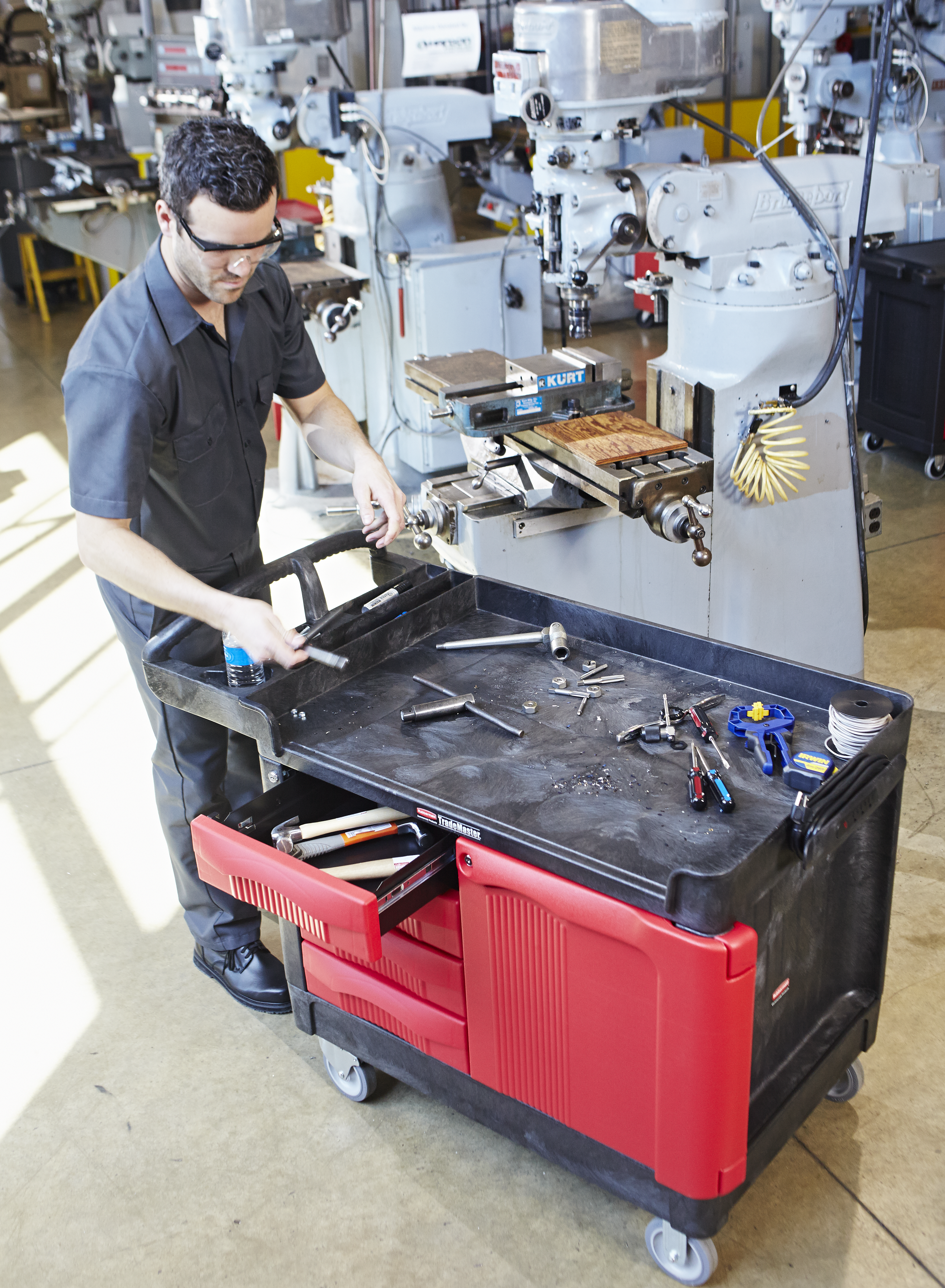 The Rubbermaid Commercial TradeMaster Mobile Work Center Utility Cart, 4 Drawer, easily transports tools and supplies where you need them.