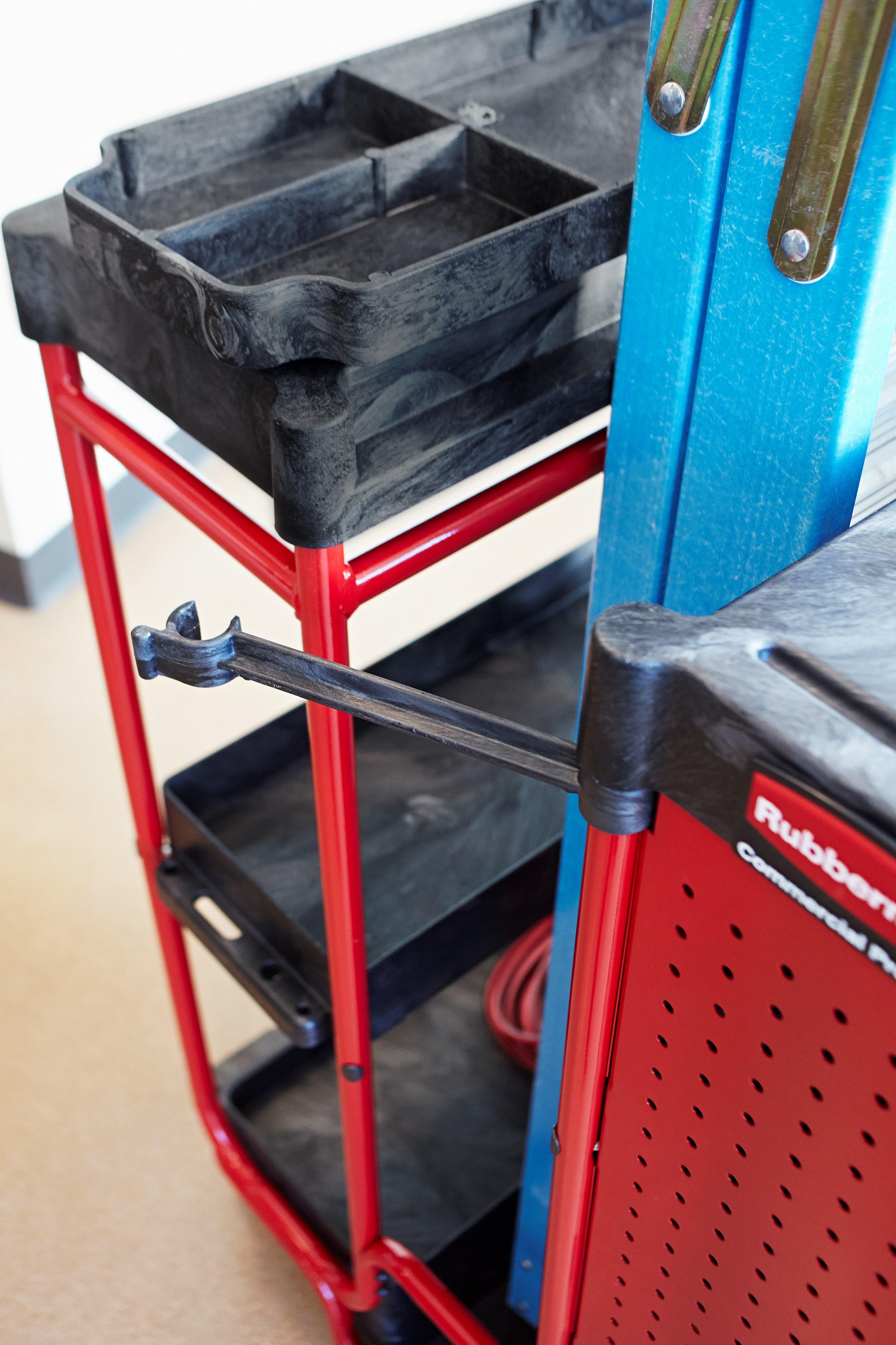 The Rubbermaid Commercial Ladder Cart with Cabinet provides greater mobility, enhanced access, safe ladder handling, and minimal storage requirements.
