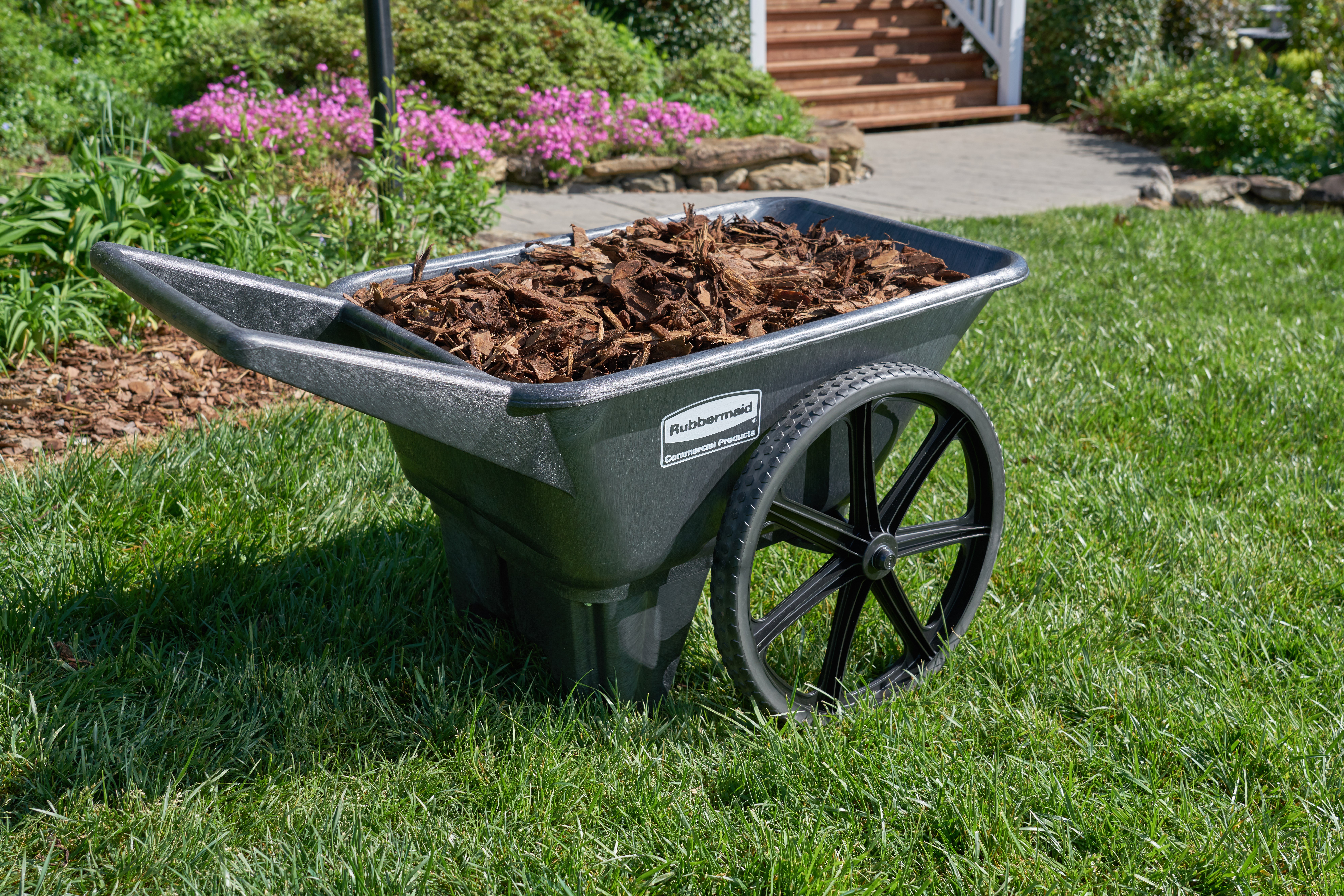 The 4 cu ft. Big Wheel Cart is an outdoor material handling solution with a 200 lb. capacity. This professional grade wheel barrow is designed for heavy-duty, long-lasting use.