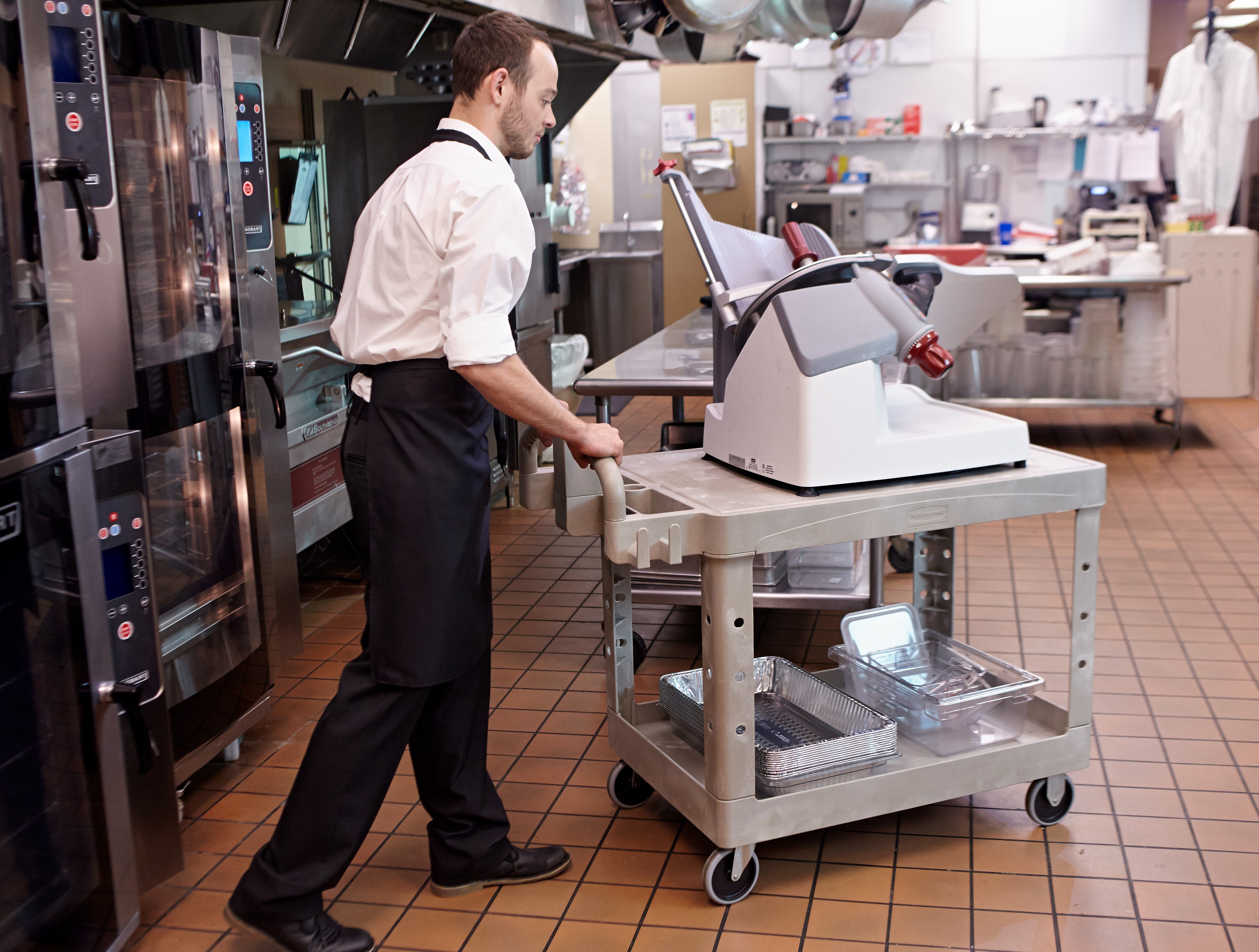 The Rubbermaid Commercial Heavy Duty 2 Shelf Utility Cart. High-density structural foam construction makes this cart sturdy, lightweight, and maneuverable.