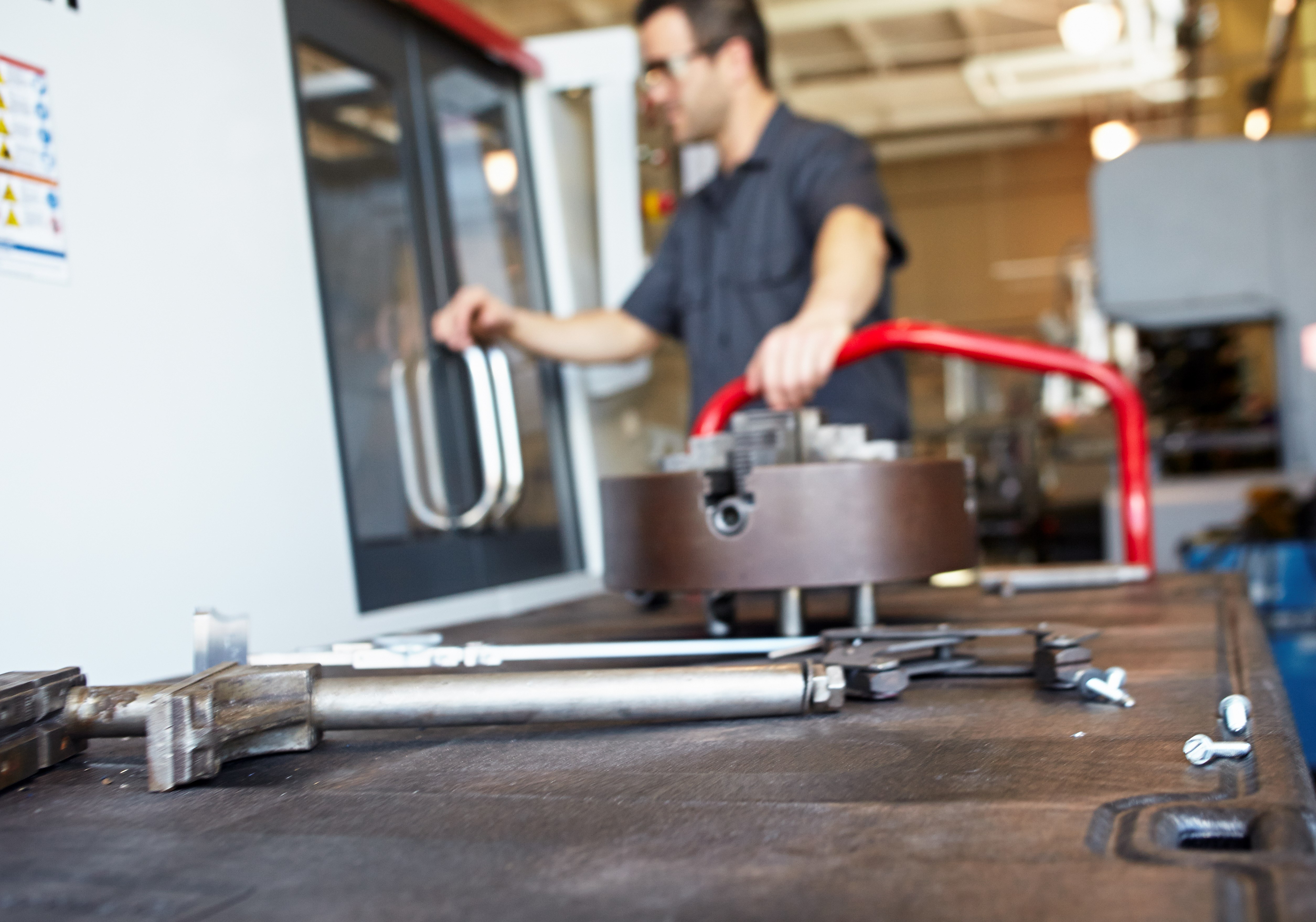 The Rubbermaid Commercial Work Height Platform Truck 30"X60" with 8"TPR casters, 2000 lb. capacity