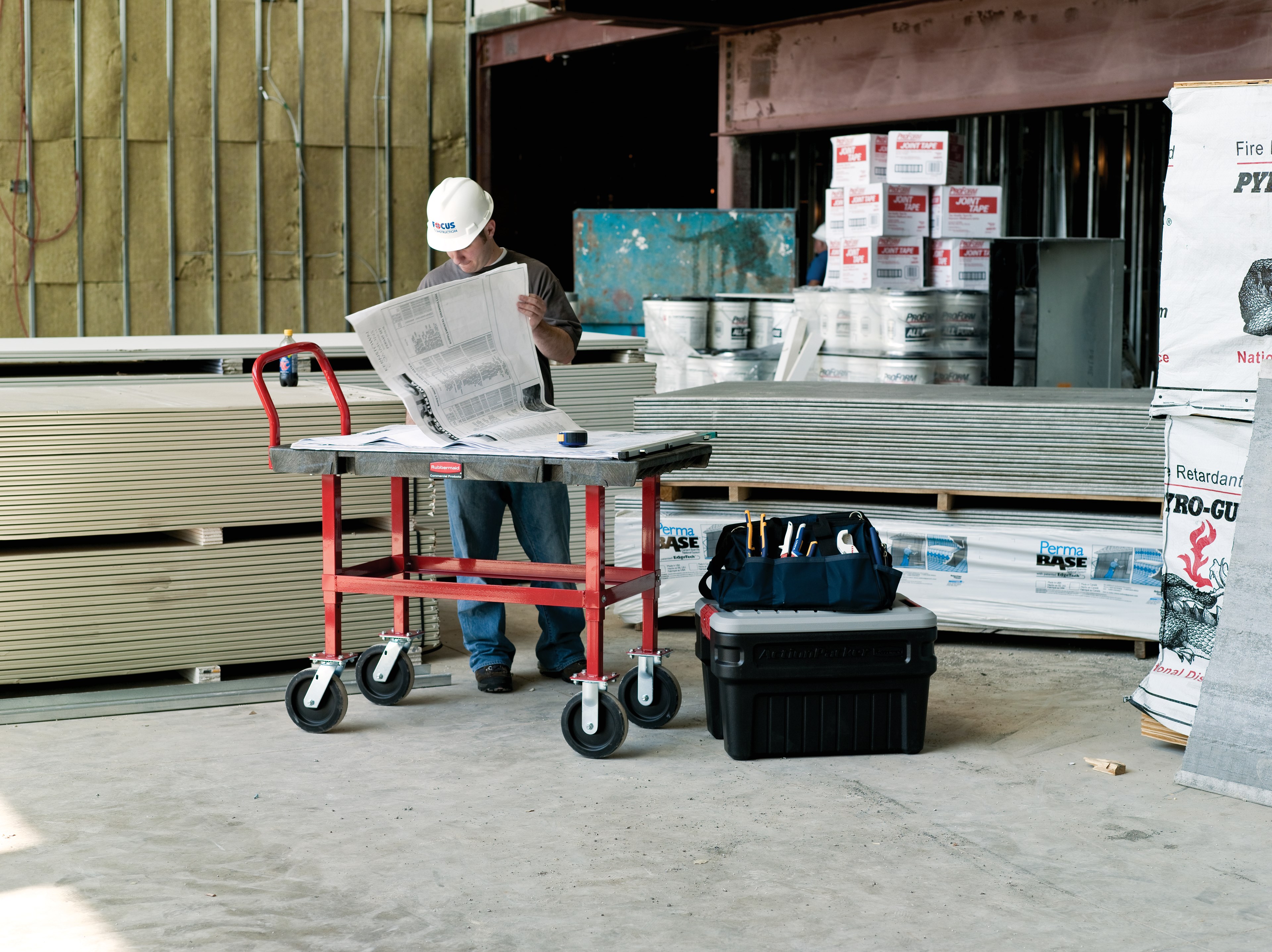 The Rubbermaid Commercial Work Height Platform 24"X48" with 8"TPR casters, 2000 lb. capacity