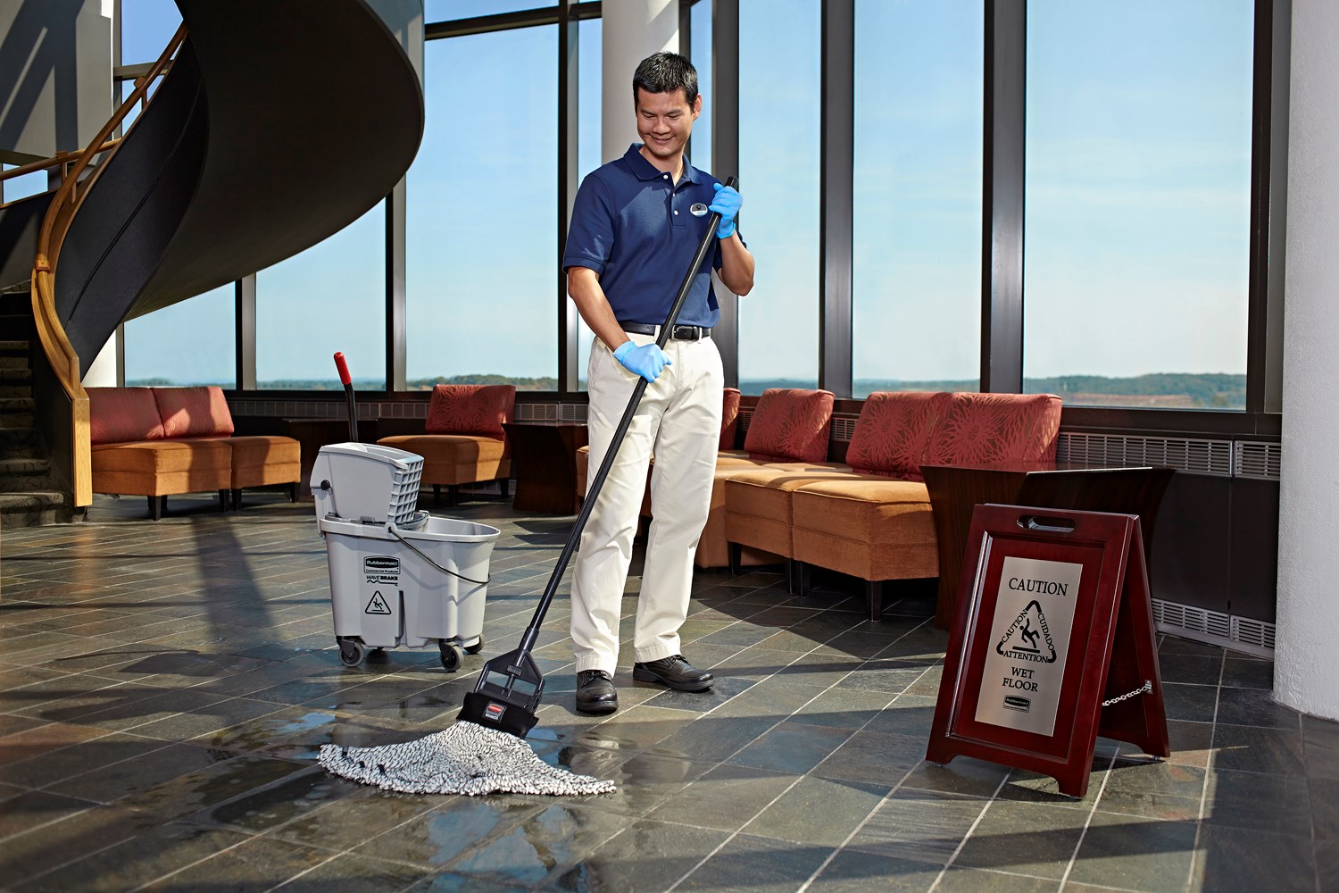 Elegant, dark hardwood "Caution" Sign is 2-sided for effective multilingual safety communication that won't disrupt a building's image.